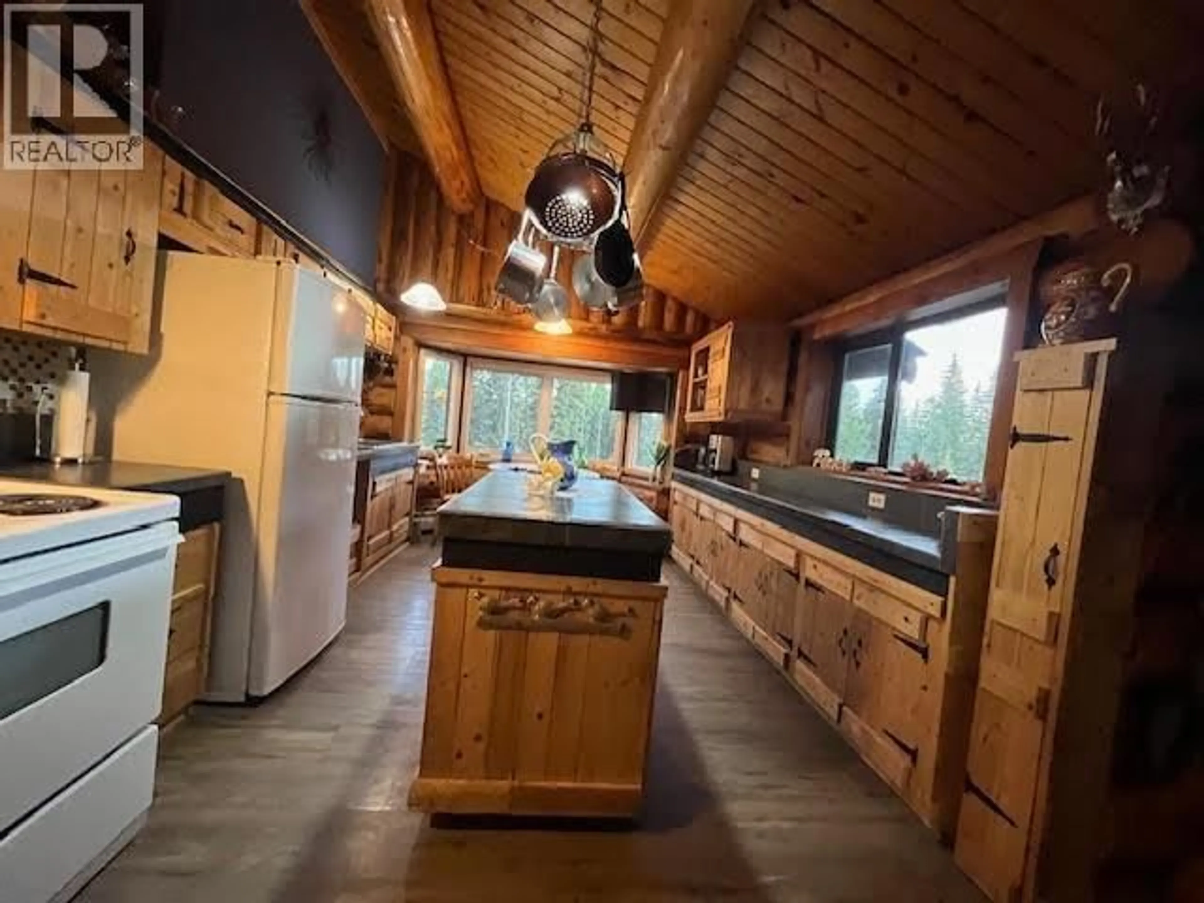 Rustic kitchen, unknown for 6006 VALLEYVIEW DRIVE, 100 Mile House British Columbia V0K2E3