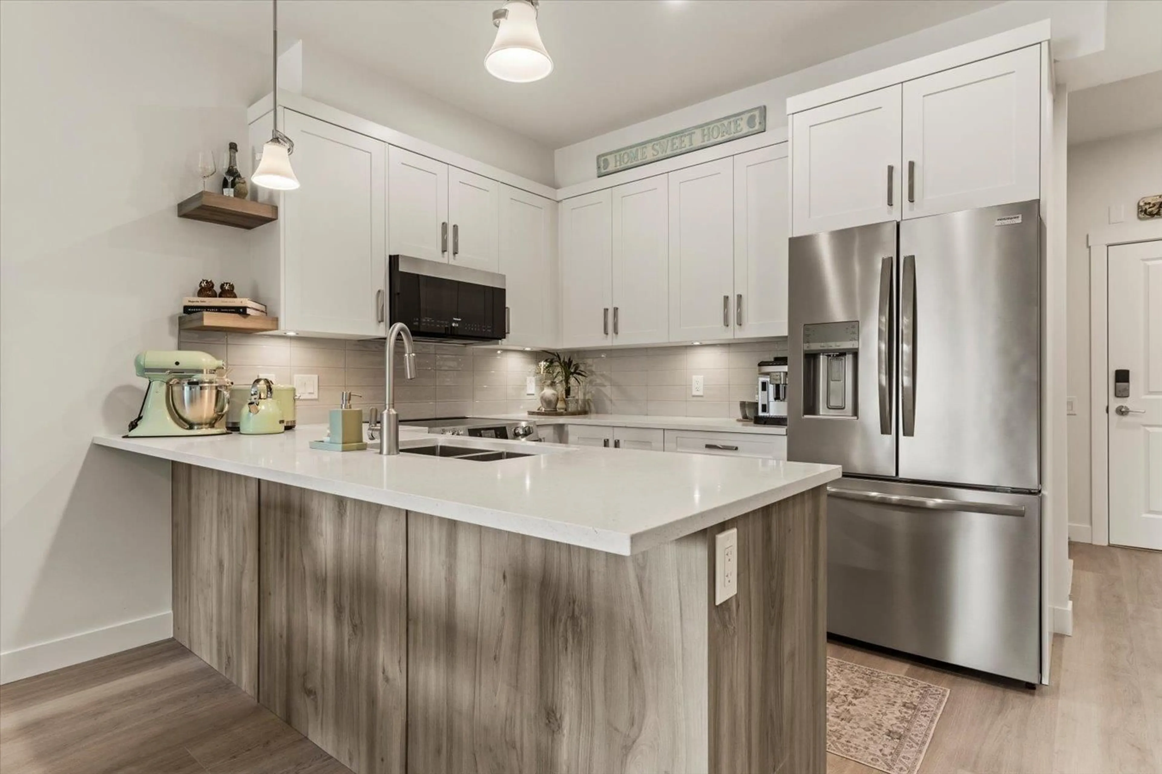 Open concept kitchen, wood/laminate floor for 122 - 8497 YOUNG ROAD, Chilliwack British Columbia V2P4P2