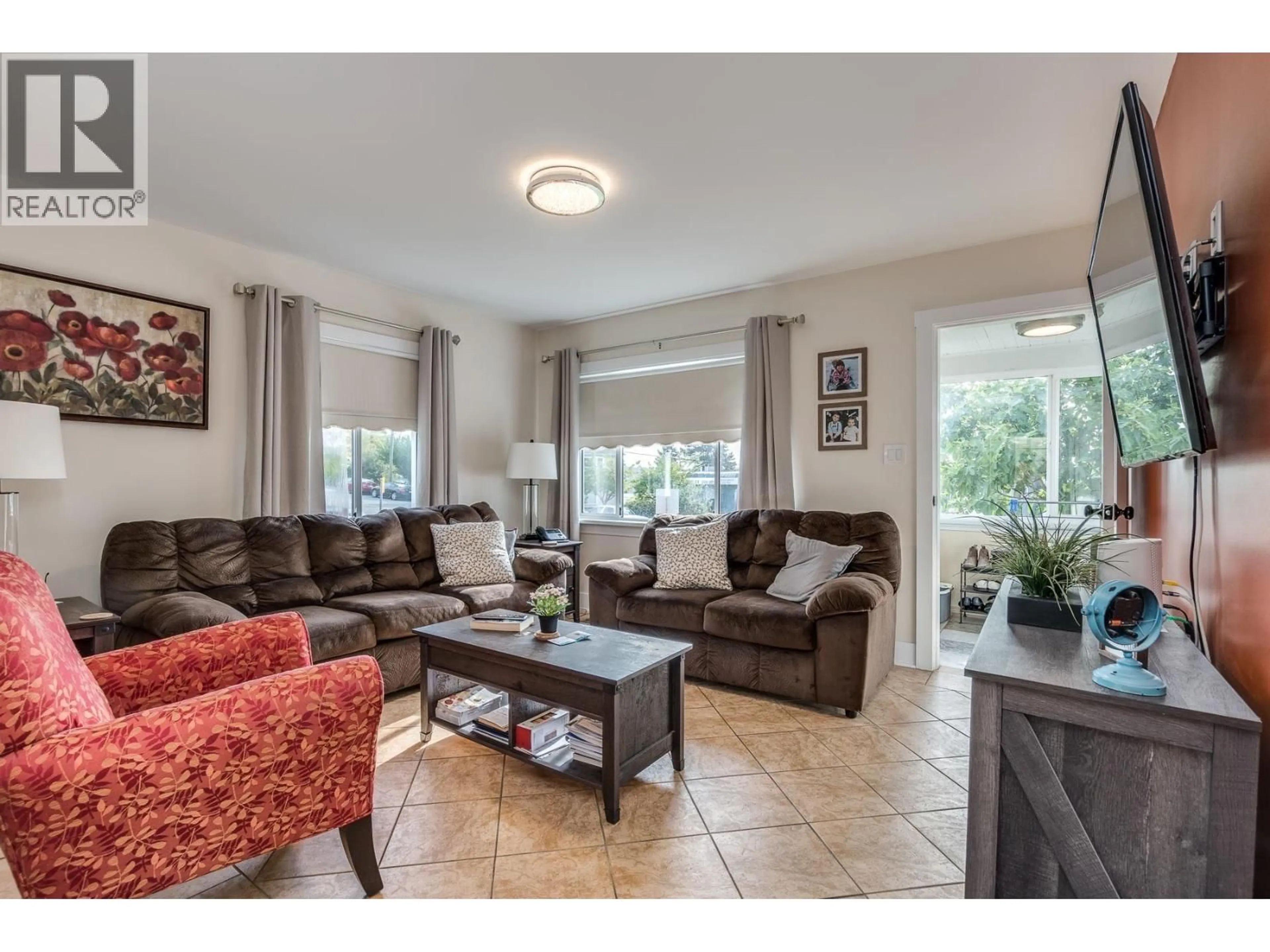 Living room with furniture, ceramic/tile floor for 1276 DOUGLAS ROAD, Burnaby British Columbia V5C4Z9