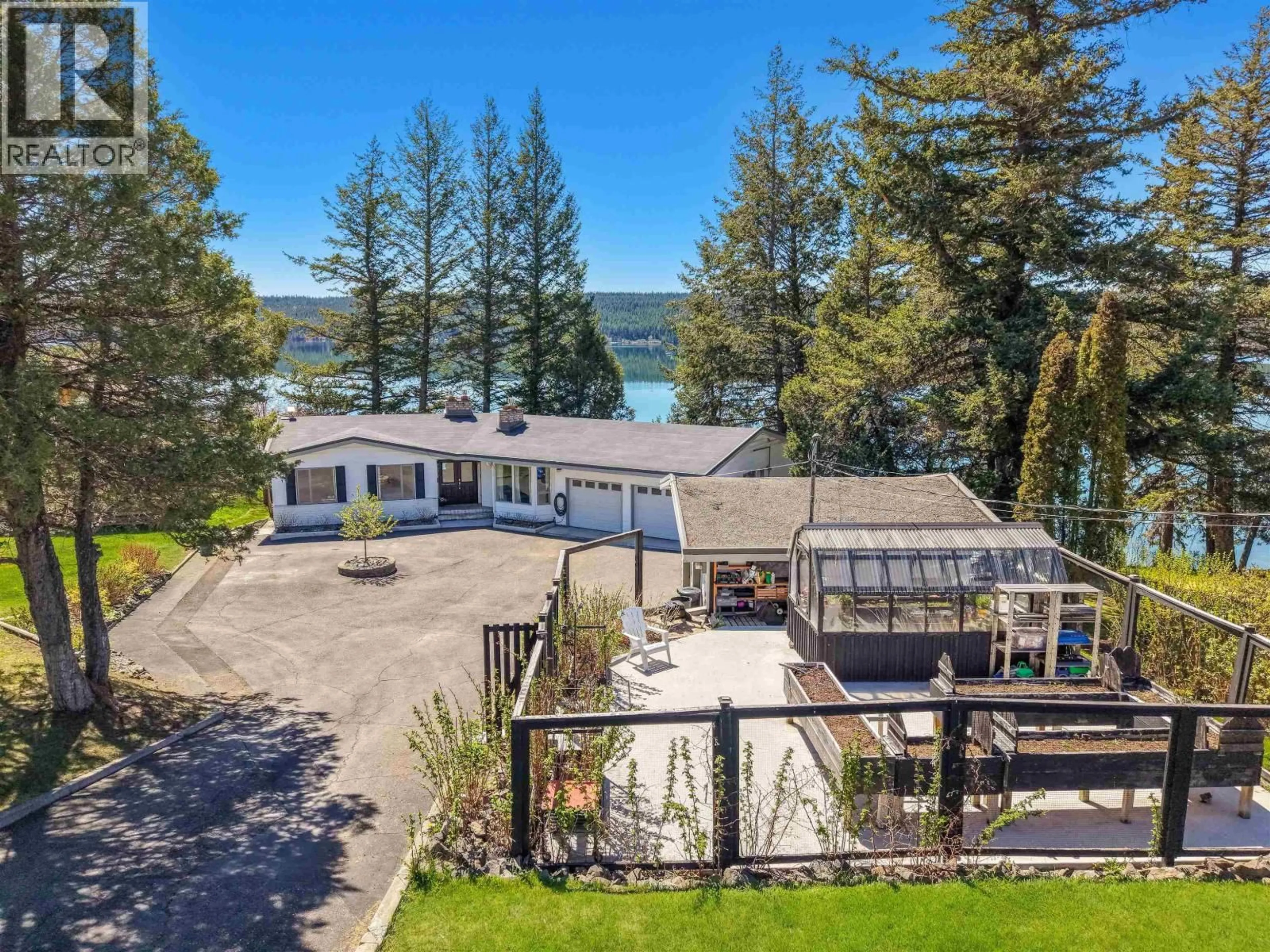 A pic from outside/outdoor area/front of a property/back of a property/a pic from drone, water/lake/river/ocean view for 3854 EMERALD CRESCENT, Lac La Hache British Columbia V0K1T1