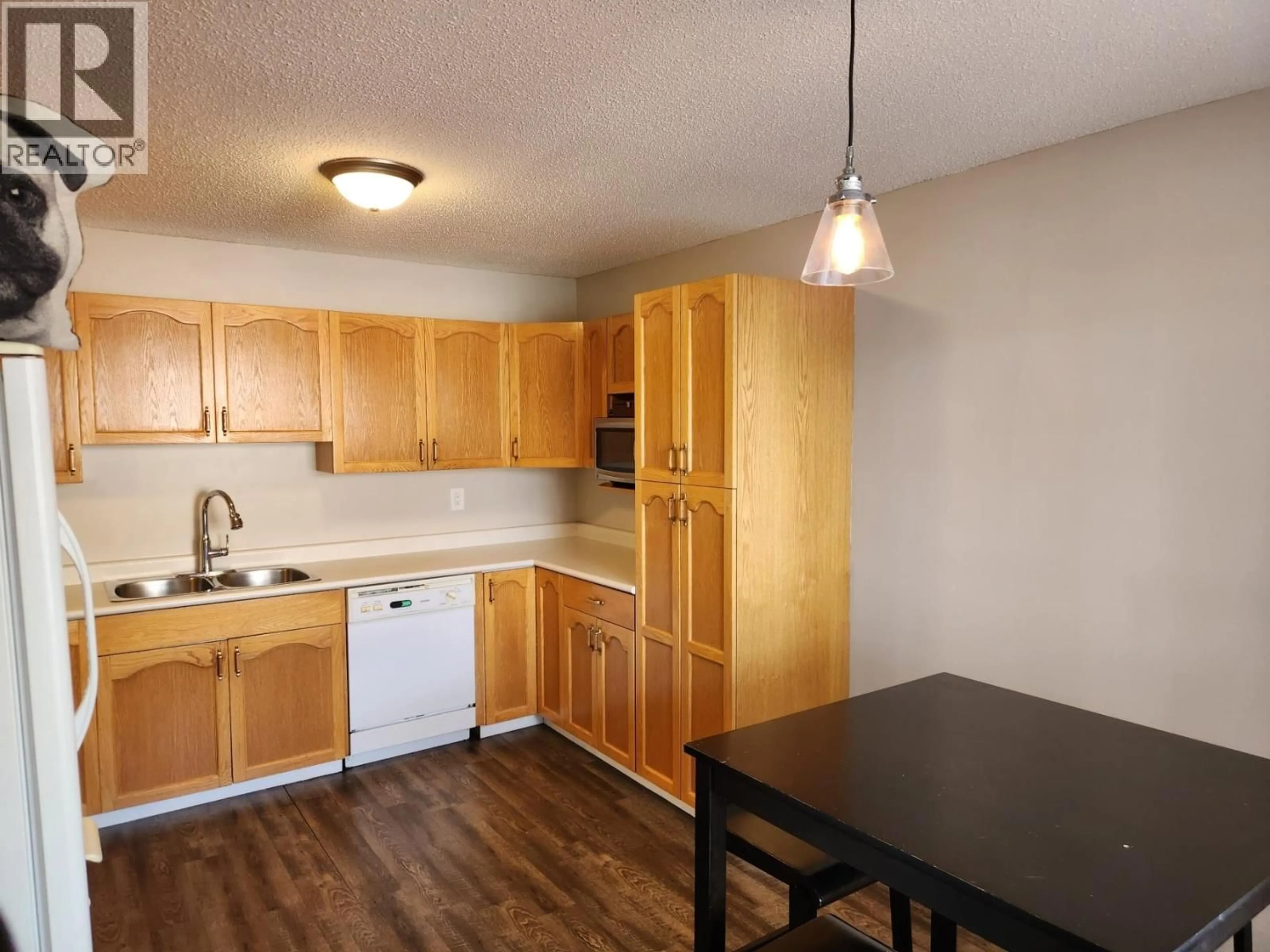 Standard kitchen, wood/laminate floor for 121 - 3233 MCGILL CRESCENT, Prince George British Columbia V2N2T4