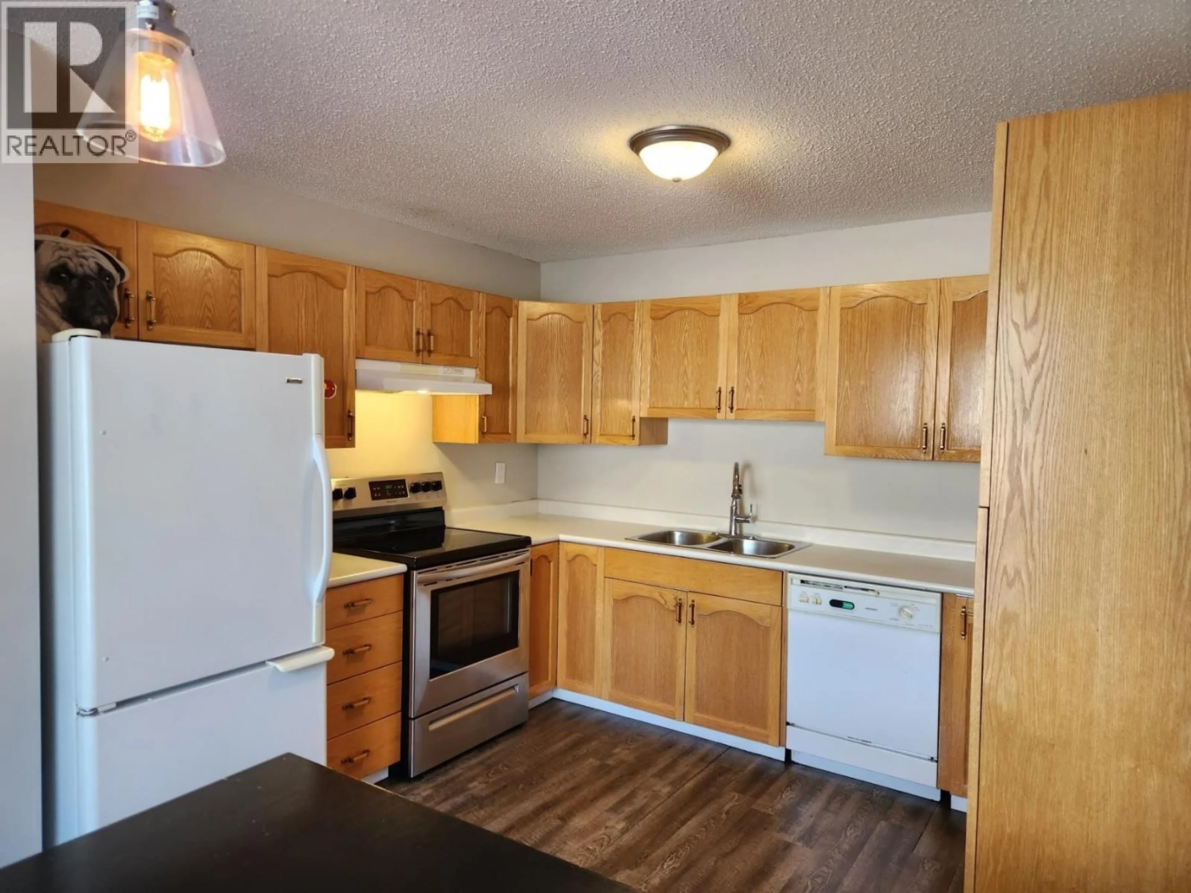 Standard kitchen, wood/laminate floor for 121 - 3233 MCGILL CRESCENT, Prince George British Columbia V2N2T4
