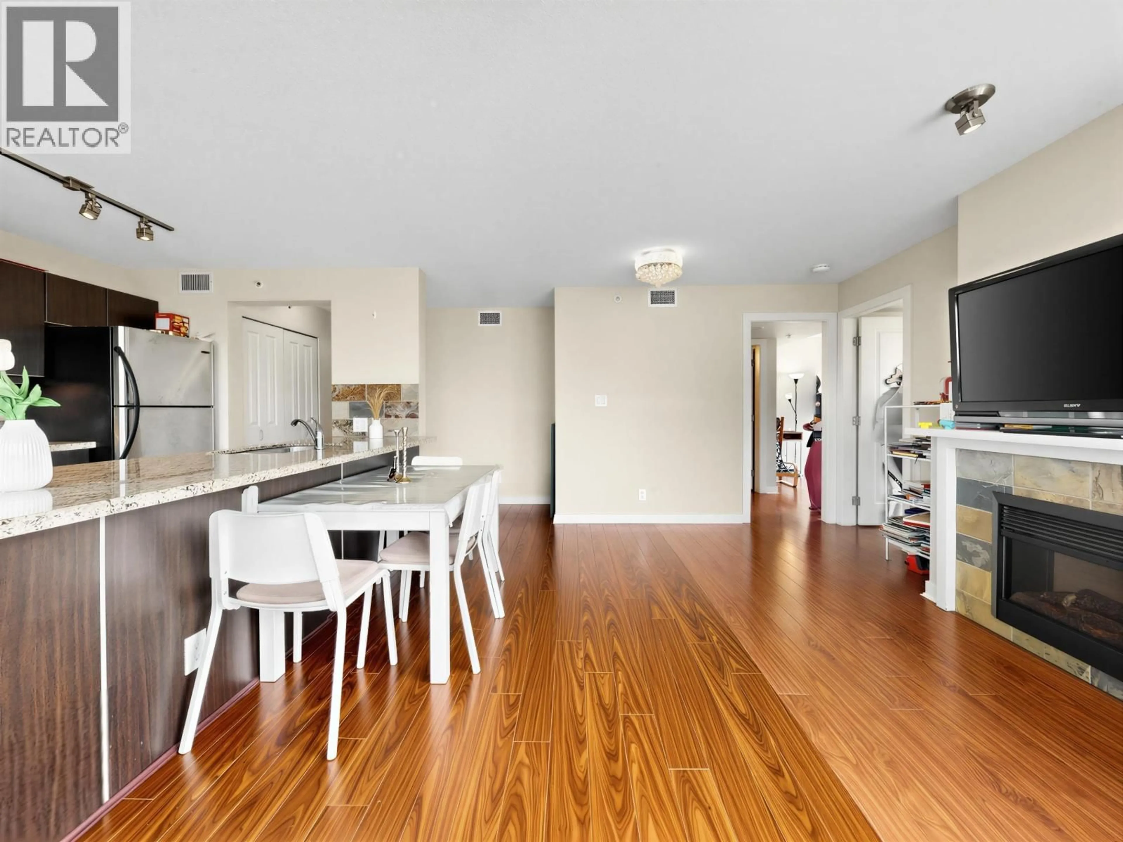 Open concept kitchen, wood/laminate floor for 607 - 6068 NO. 3 ROAD, Richmond British Columbia V6Y4M7