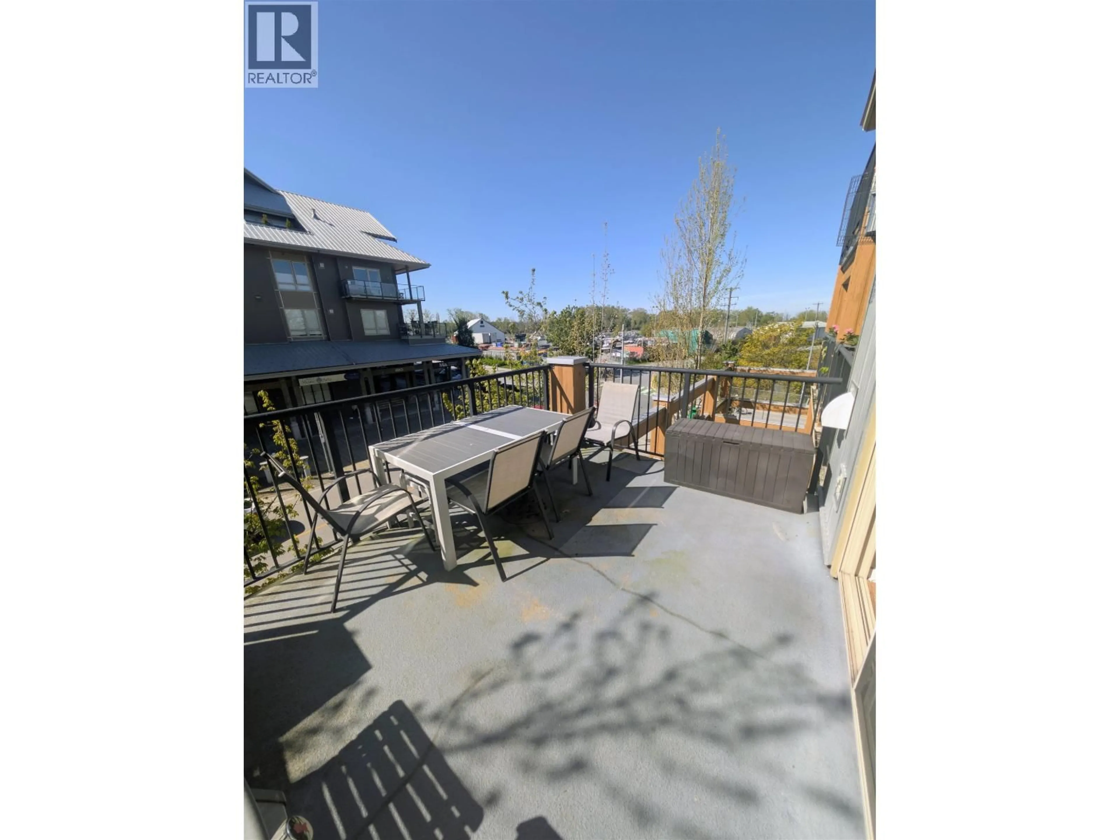 A pic from outside/outdoor area/front of a property/back of a property/a pic from drone, water/lake/river/ocean view for 206 - 6077 LONDON ROAD, Richmond British Columbia V7E0A7