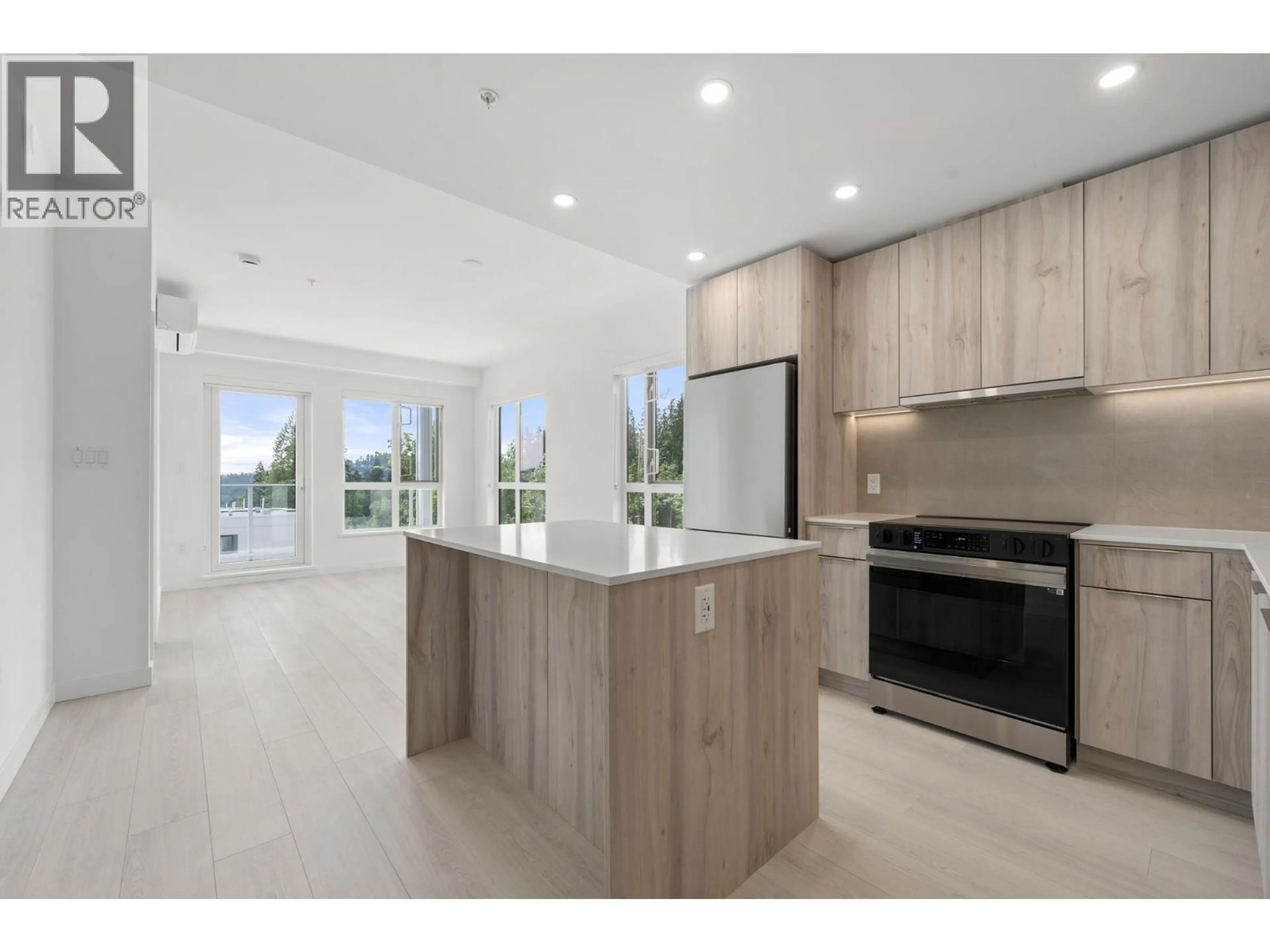 Open concept kitchen, unknown for 404 - 3594 MALSUM DRIVE, North Vancouver British Columbia V7G0B4