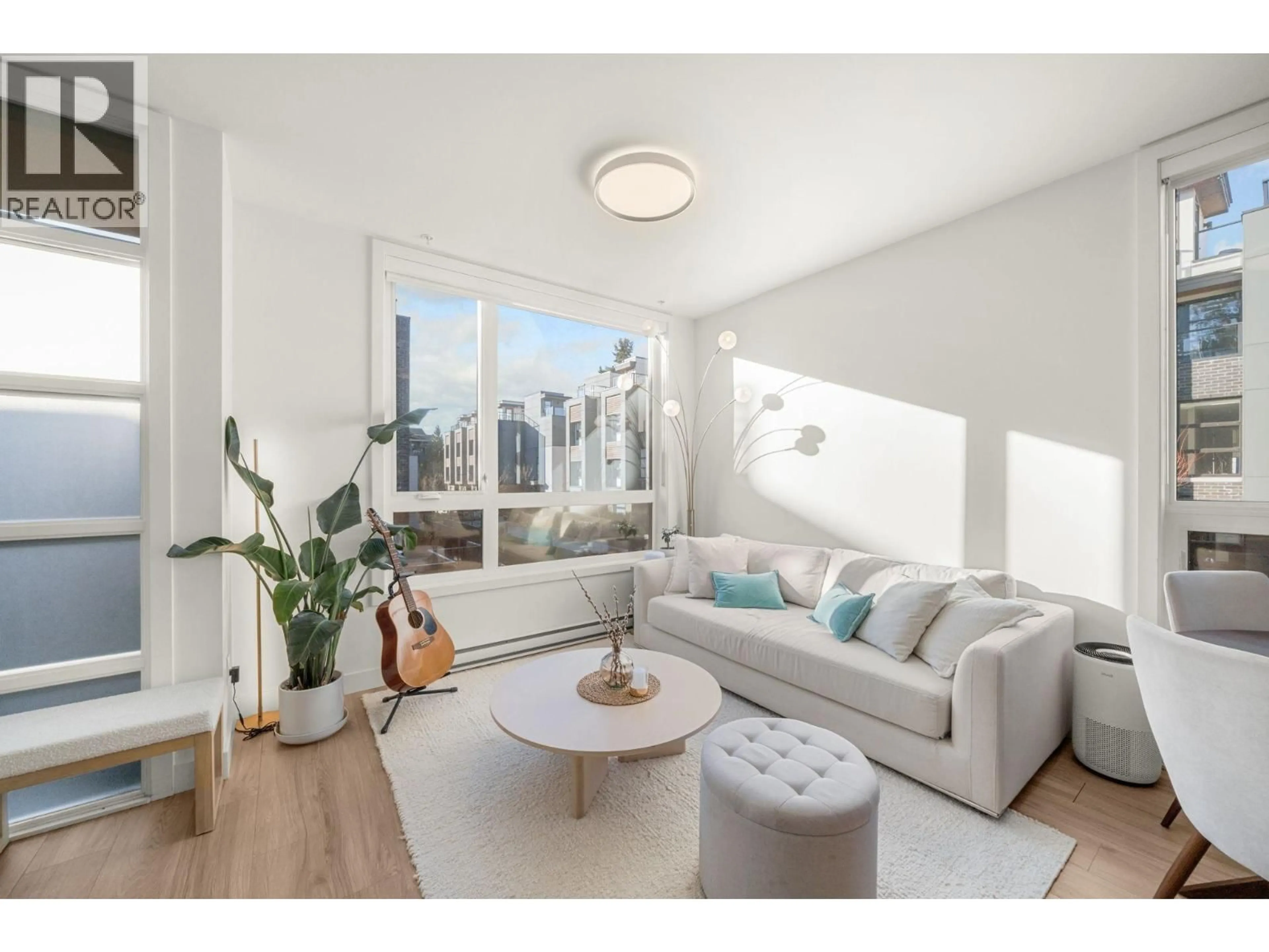 Living room with furniture, unknown for 312 - 6085 IRMIN STREET, Burnaby British Columbia V5J0J7