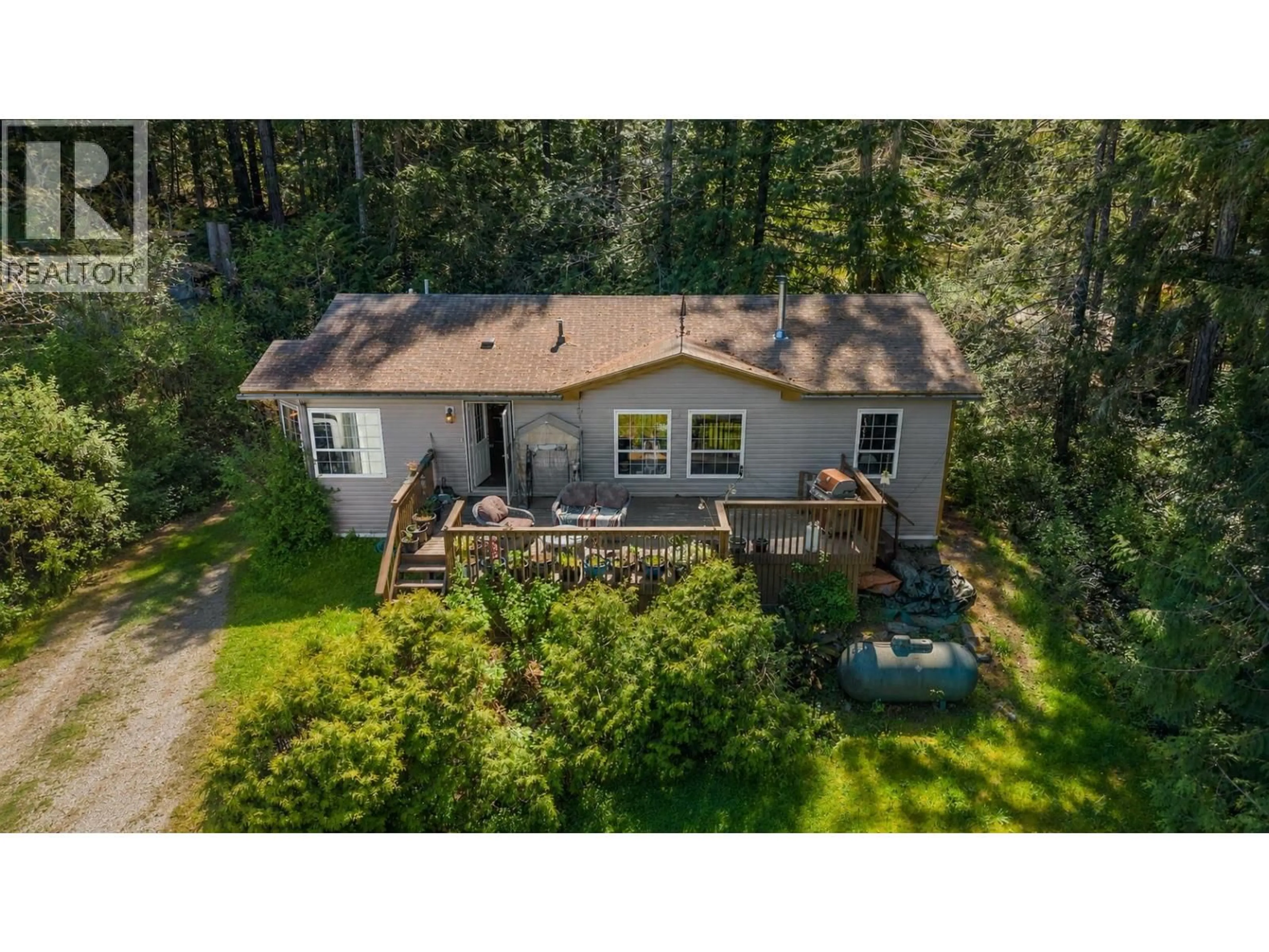 A pic from outside/outdoor area/front of a property/back of a property/a pic from drone, forest/trees view for 13262 PORTERS ROAD, Madeira Park British Columbia V0N2H1