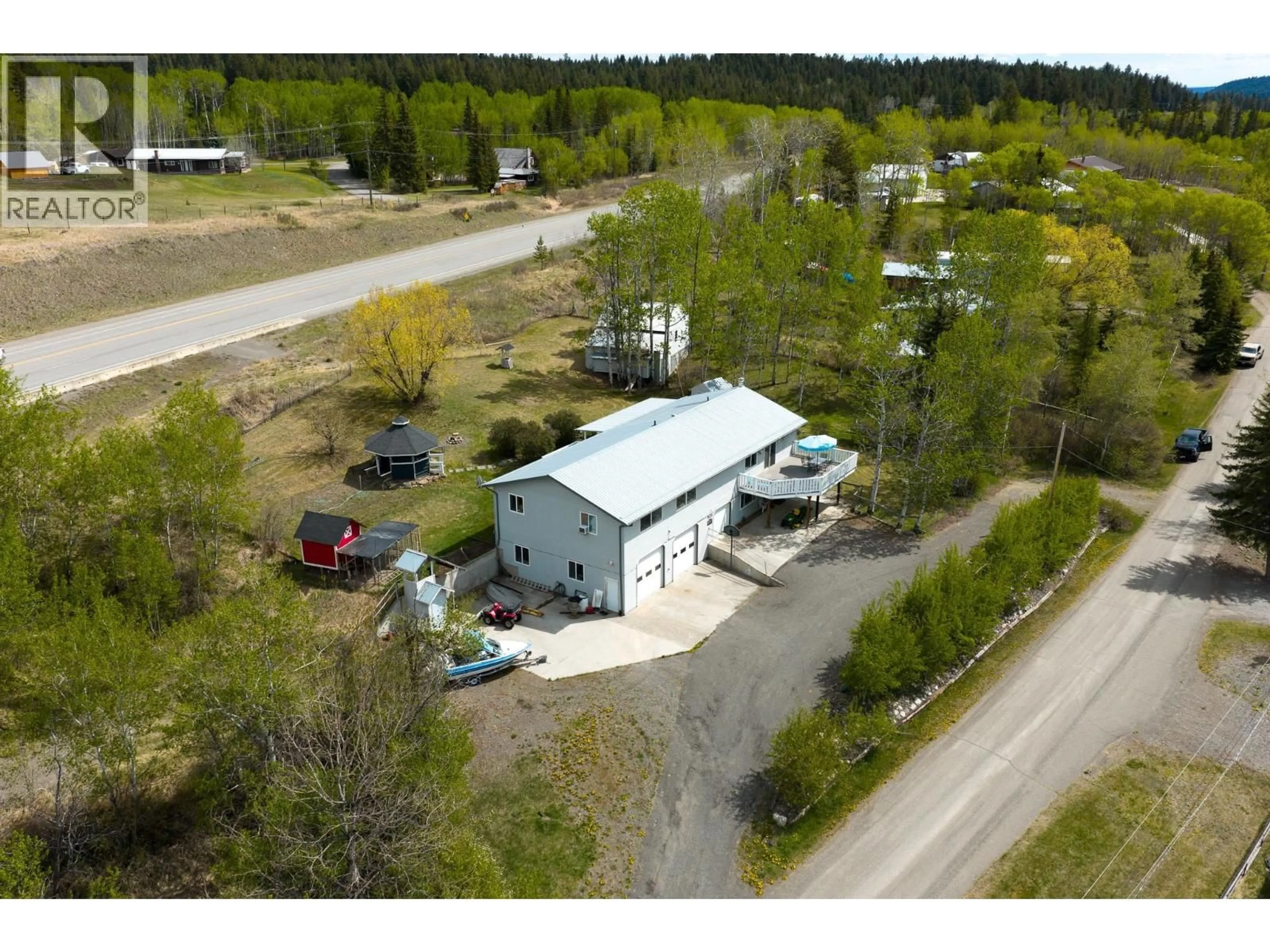 A pic from outside/outdoor area/front of a property/back of a property/a pic from drone, building for 3451 DUNSMUIR ROAD, Lac La Hache British Columbia V0K1T1