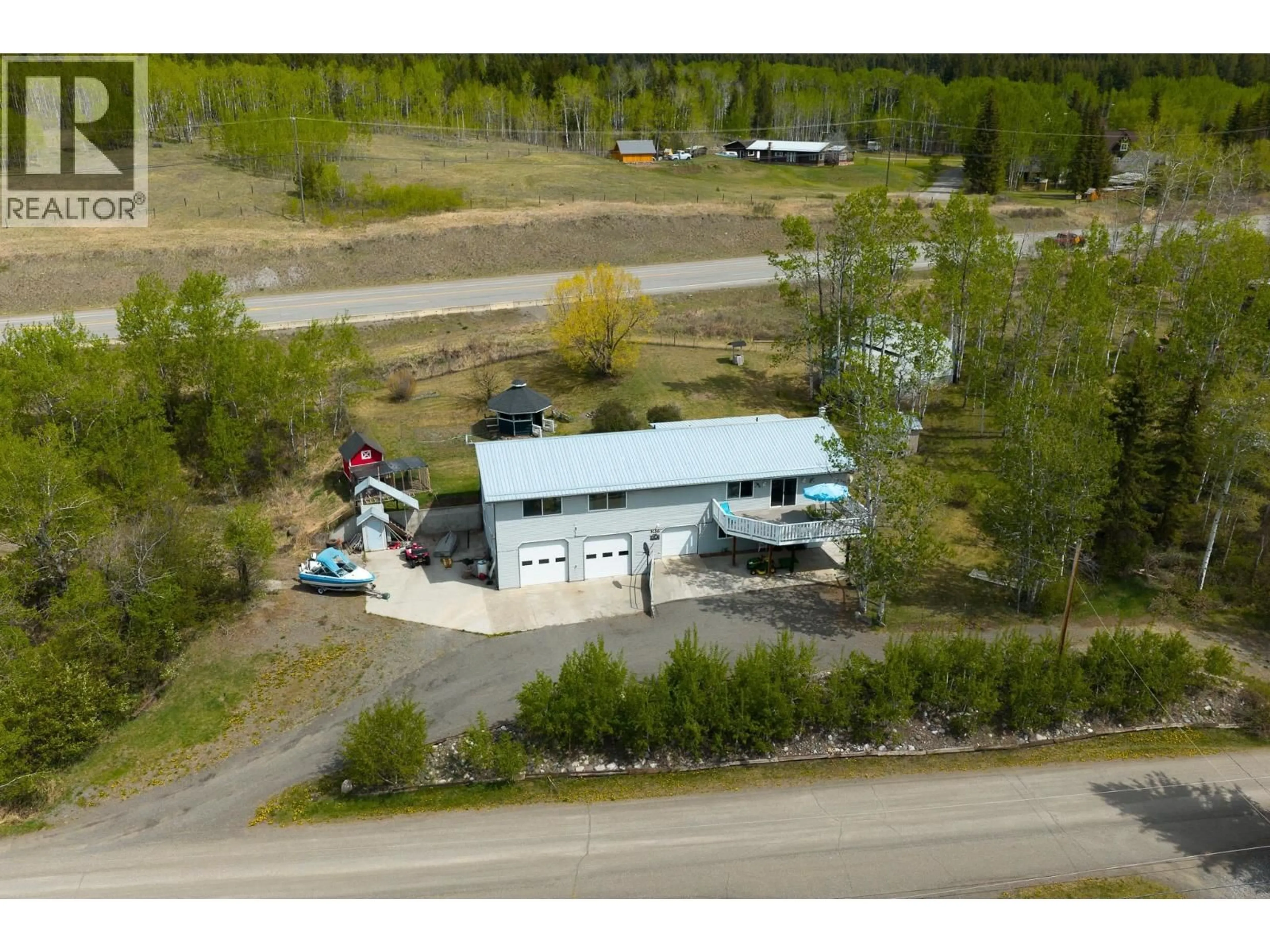 A pic from outside/outdoor area/front of a property/back of a property/a pic from drone, building for 3451 DUNSMUIR ROAD, Lac La Hache British Columbia V0K1T1