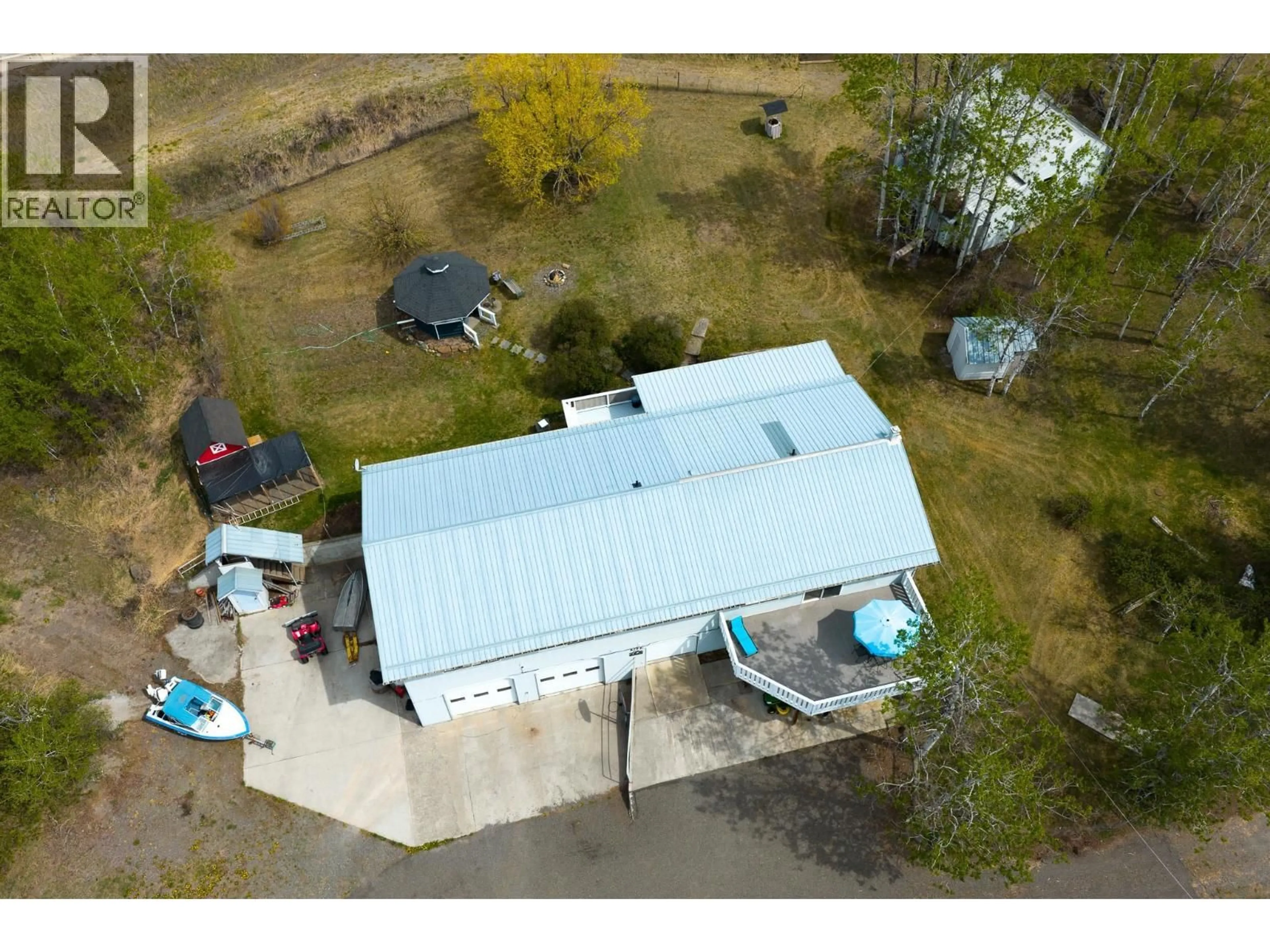 A pic from outside/outdoor area/front of a property/back of a property/a pic from drone, building for 3451 DUNSMUIR ROAD, Lac La Hache British Columbia V0K1T1