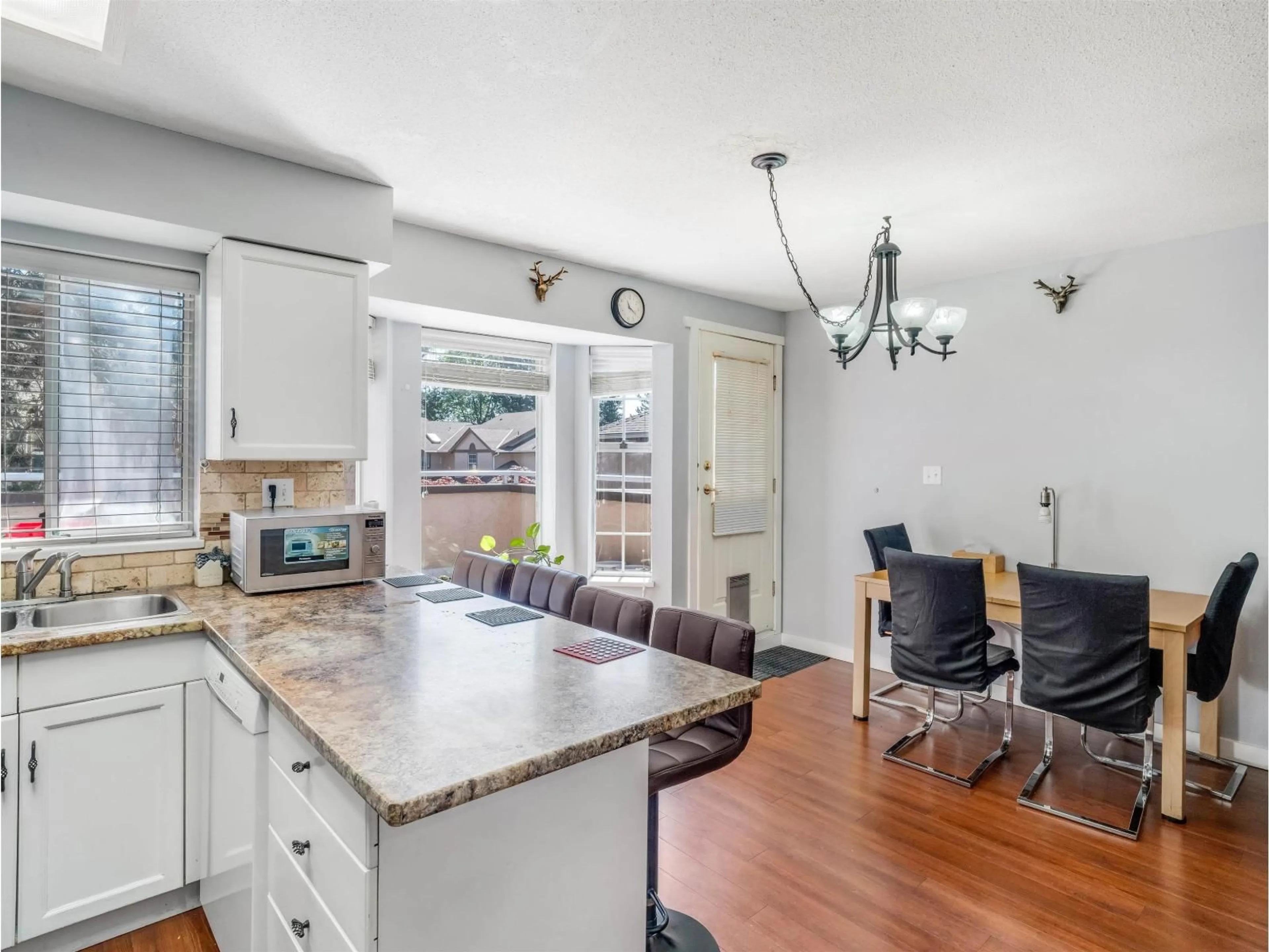 Open concept kitchen, ceramic/tile floor for 221 - 14861 98 AVENUE, Surrey British Columbia V3R0A2