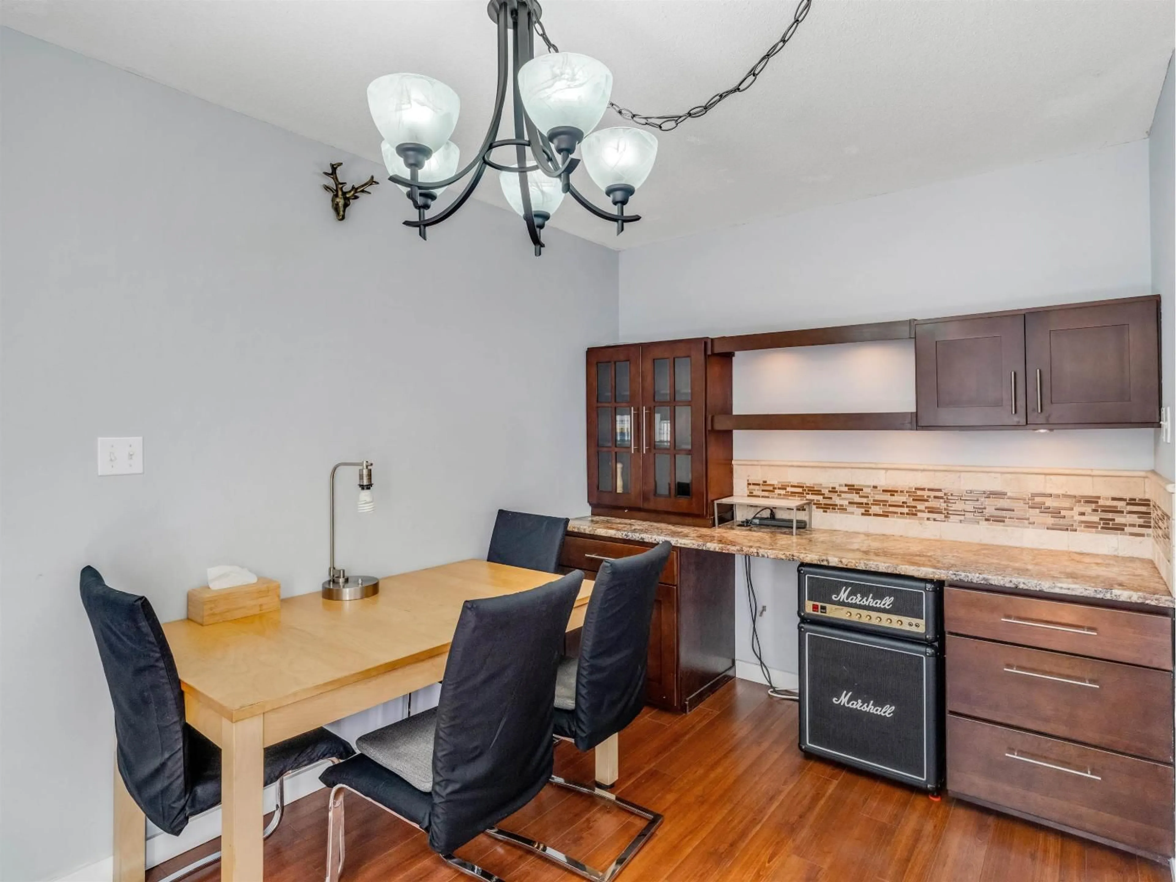 Open concept kitchen, wood/laminate floor for 221 - 14861 98 AVENUE, Surrey British Columbia V3R0A2