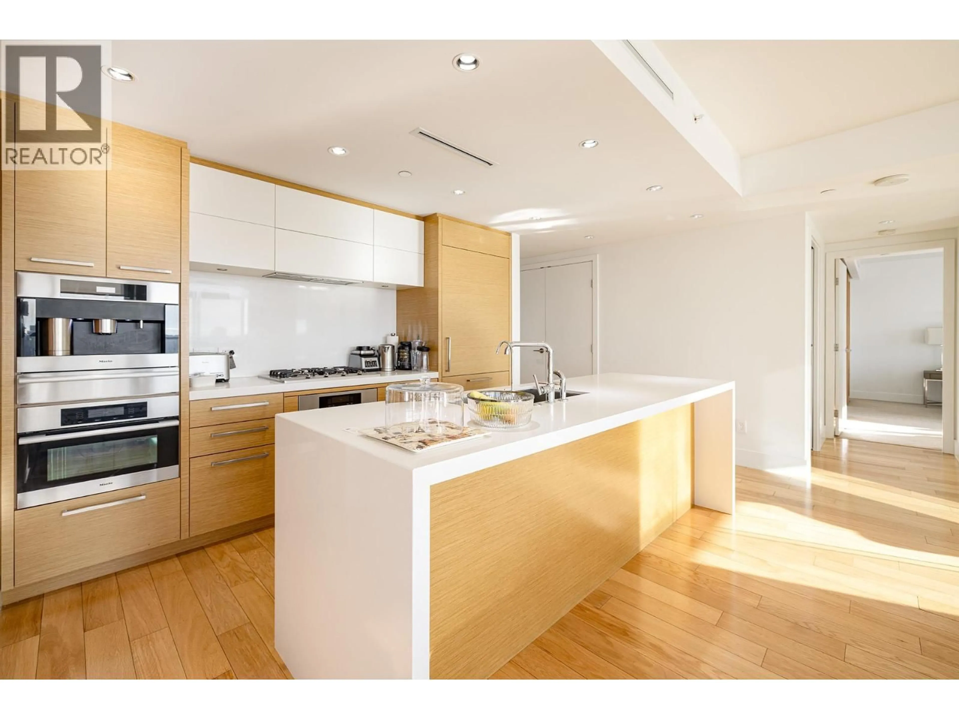 Open concept kitchen, wood/laminate floor for 3001 - 667 HOWE STREET, Vancouver British Columbia V6C0B5