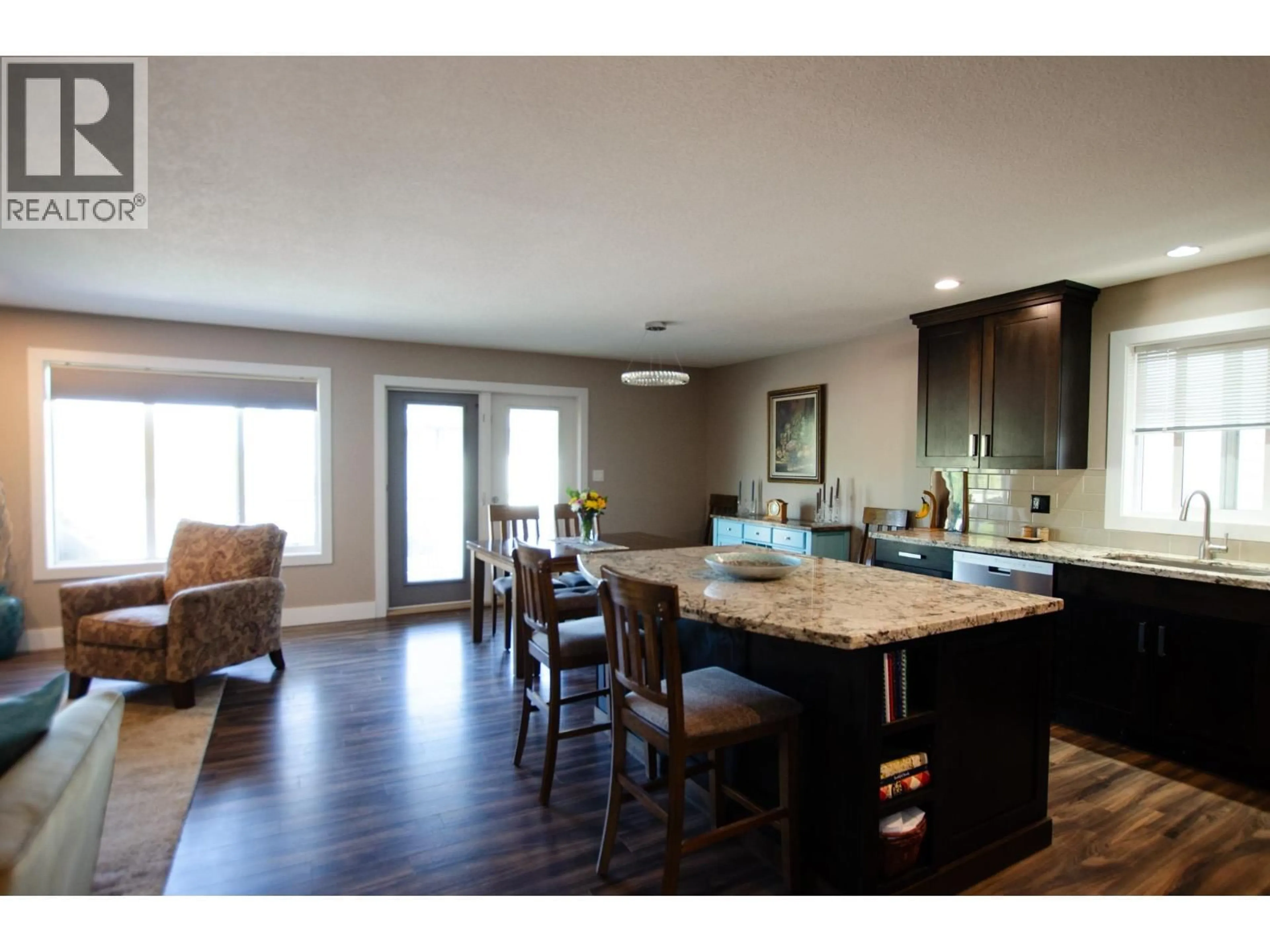 Open concept kitchen, wood/laminate floor for 1414 OMINECA PLACE, Prince George British Columbia V2N0B7