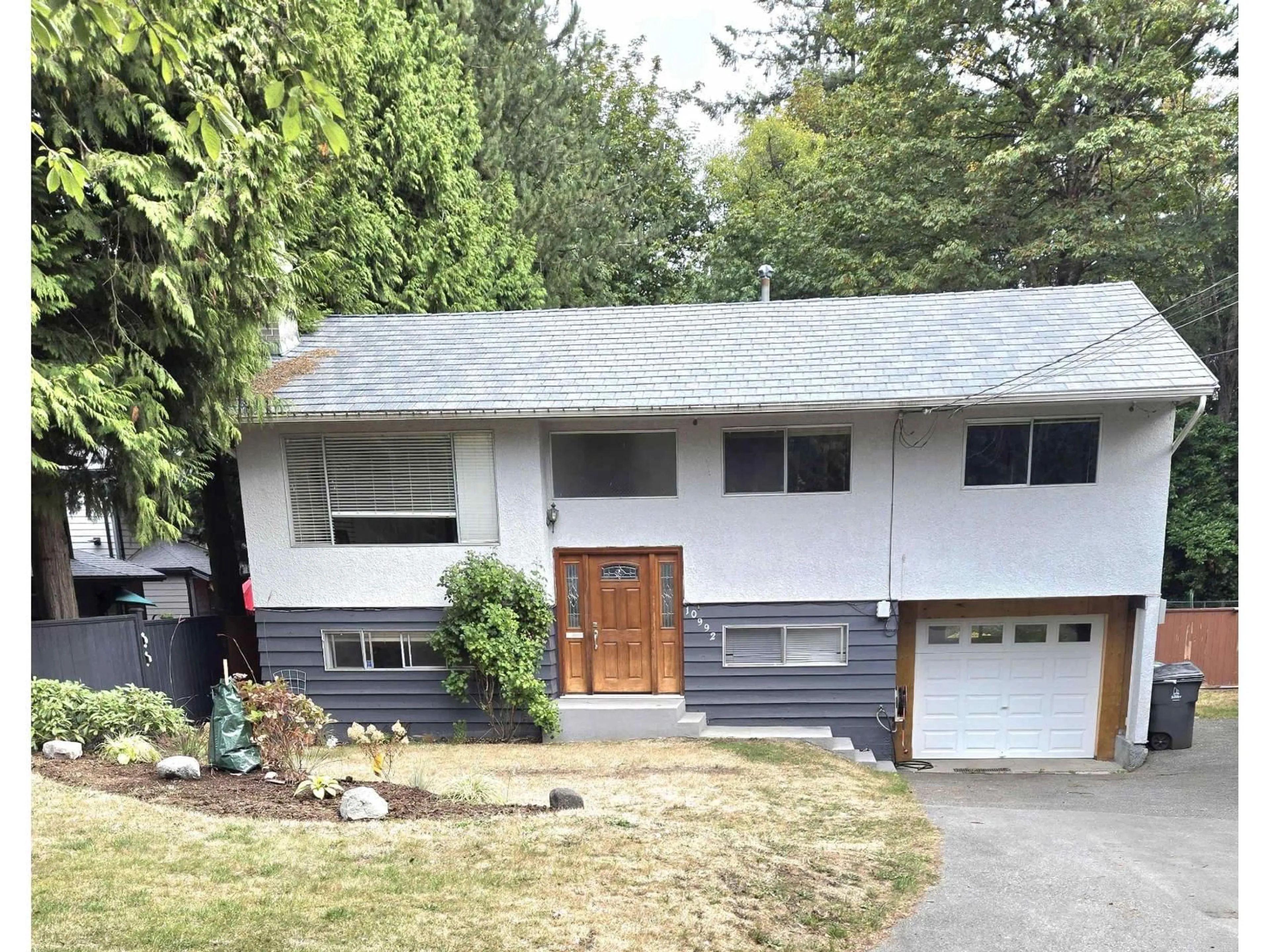 Home with vinyl exterior material, street for 10992 132A STREET, Surrey British Columbia V3T3Y4