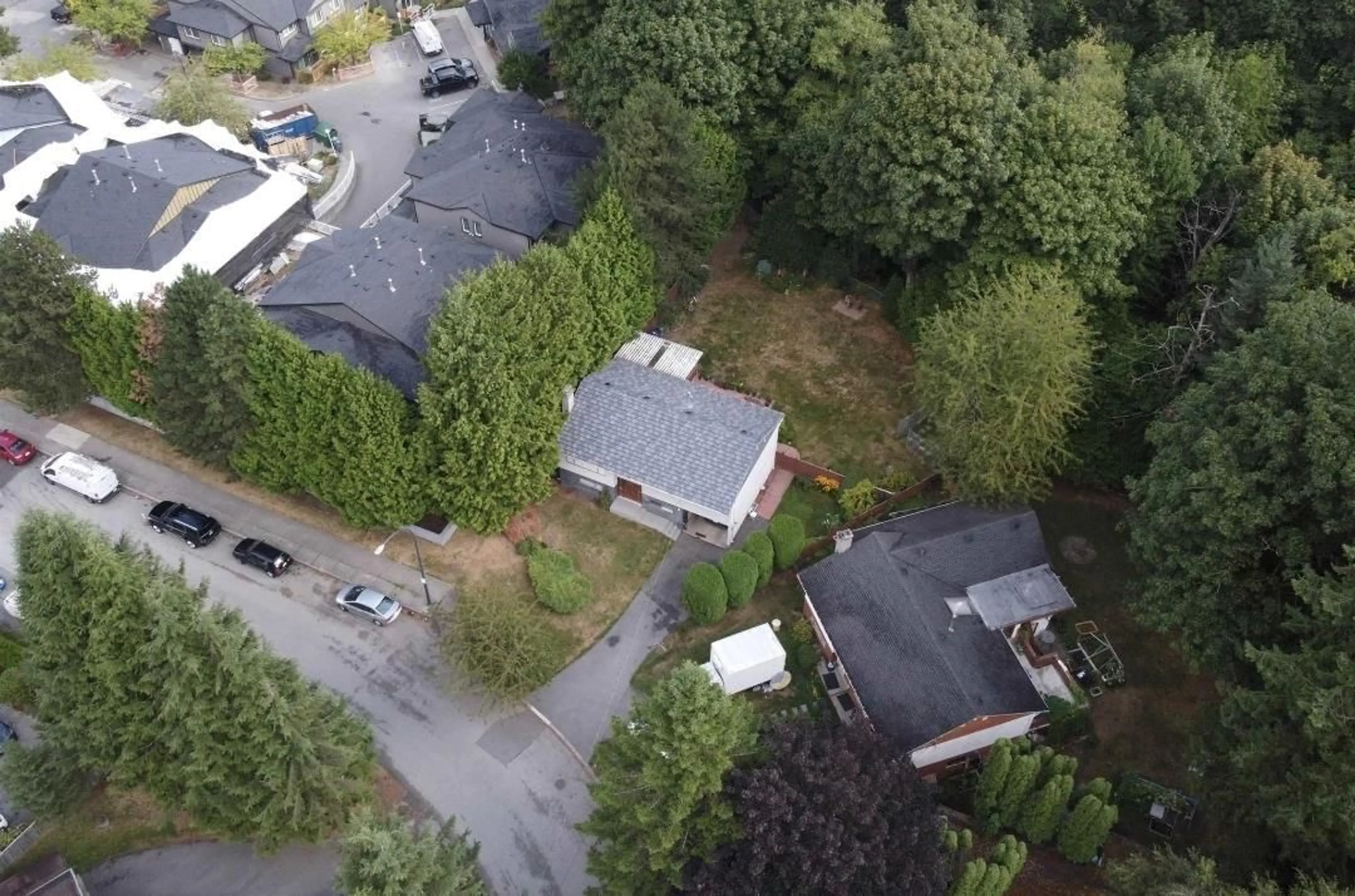 A pic from outside/outdoor area/front of a property/back of a property/a pic from drone, street for 10992 132A STREET, Surrey British Columbia V3T3Y4