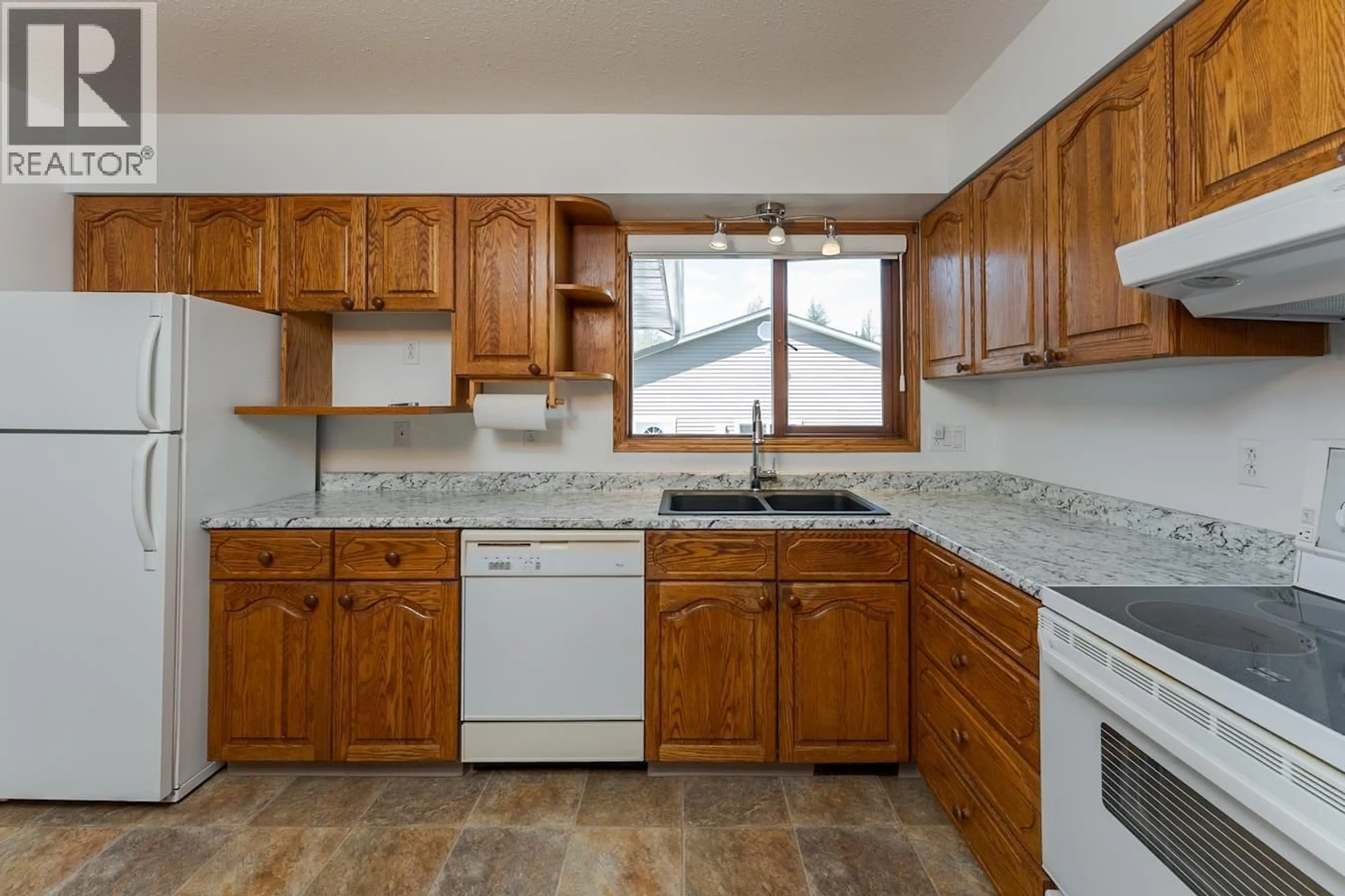 Standard kitchen, ceramic/tile floor for 4642 MARTIN ROAD, Prince George British Columbia V2K2K1
