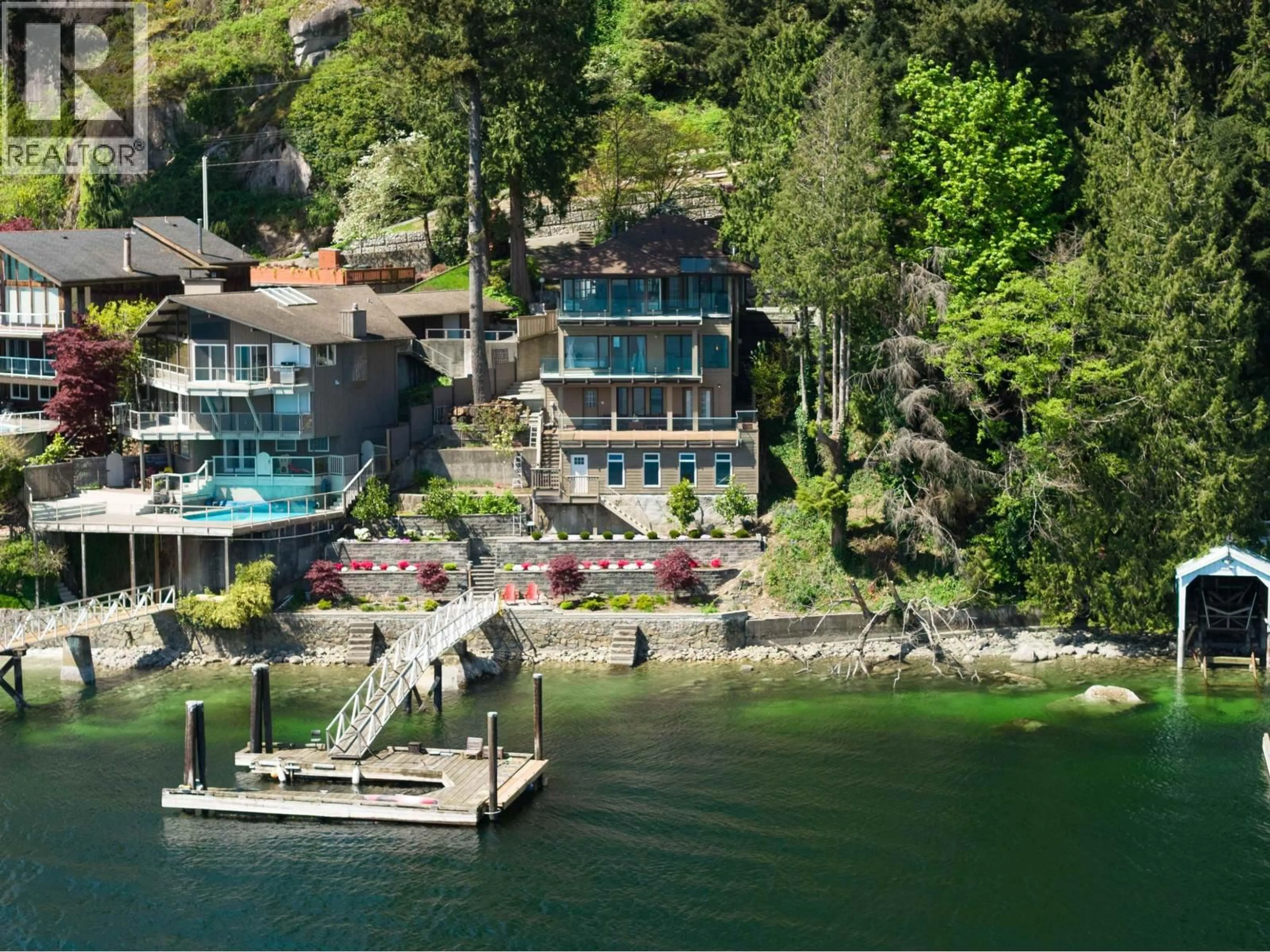 A pic from outside/outdoor area/front of a property/back of a property/a pic from drone, water/lake/river/ocean view for 4793 STRATHCONA ROAD, North Vancouver British Columbia V7G1G9