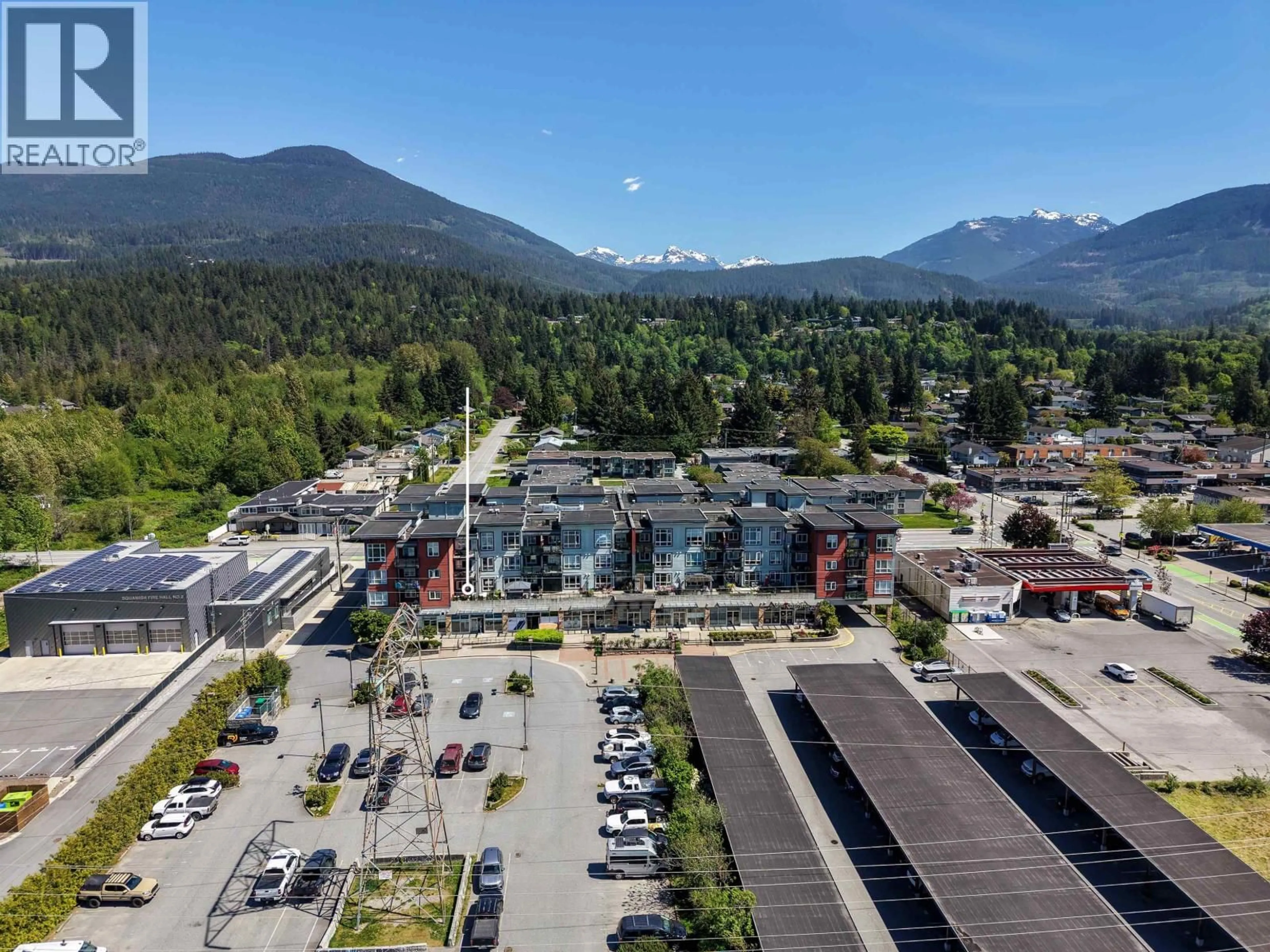 A pic from outside/outdoor area/front of a property/back of a property/a pic from drone, mountain view for 220 - 40437 TANTALUS ROAD, Squamish British Columbia V0N1T0