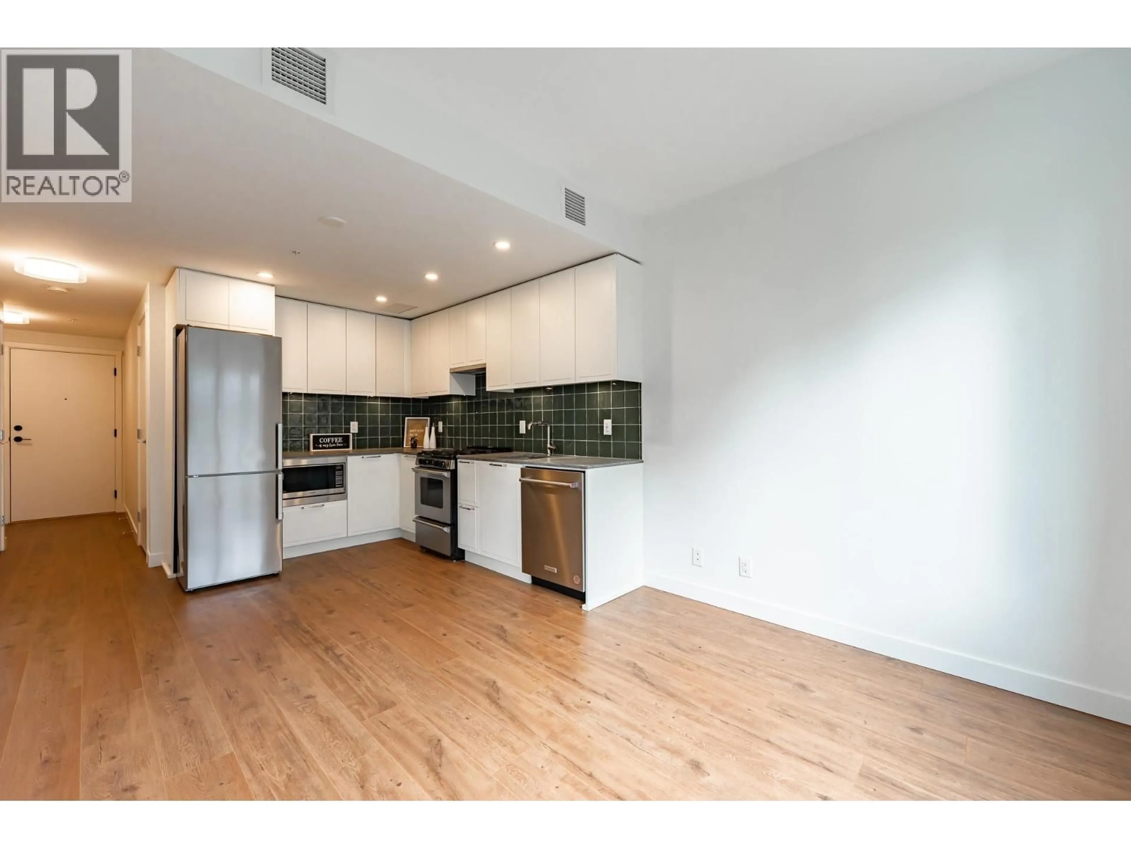 Open concept kitchen, wood/laminate floor for 402 - 648 LEA AVENUE, Coquitlam British Columbia V3J0P1