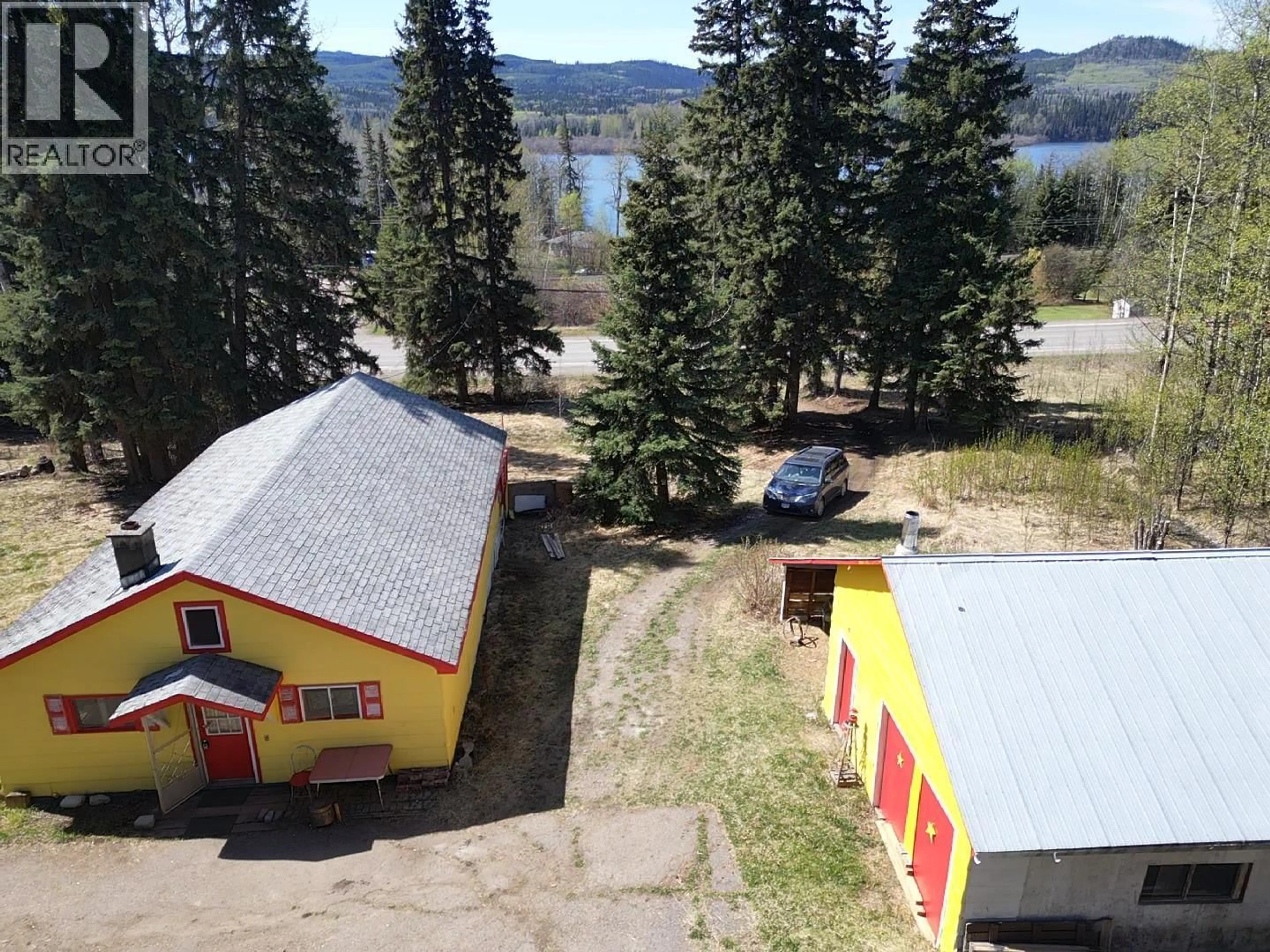 A pic from outside/outdoor area/front of a property/back of a property/a pic from drone, mountain view for 10258 W 16 HIGHWAY, Burns Lake British Columbia V0J1E1
