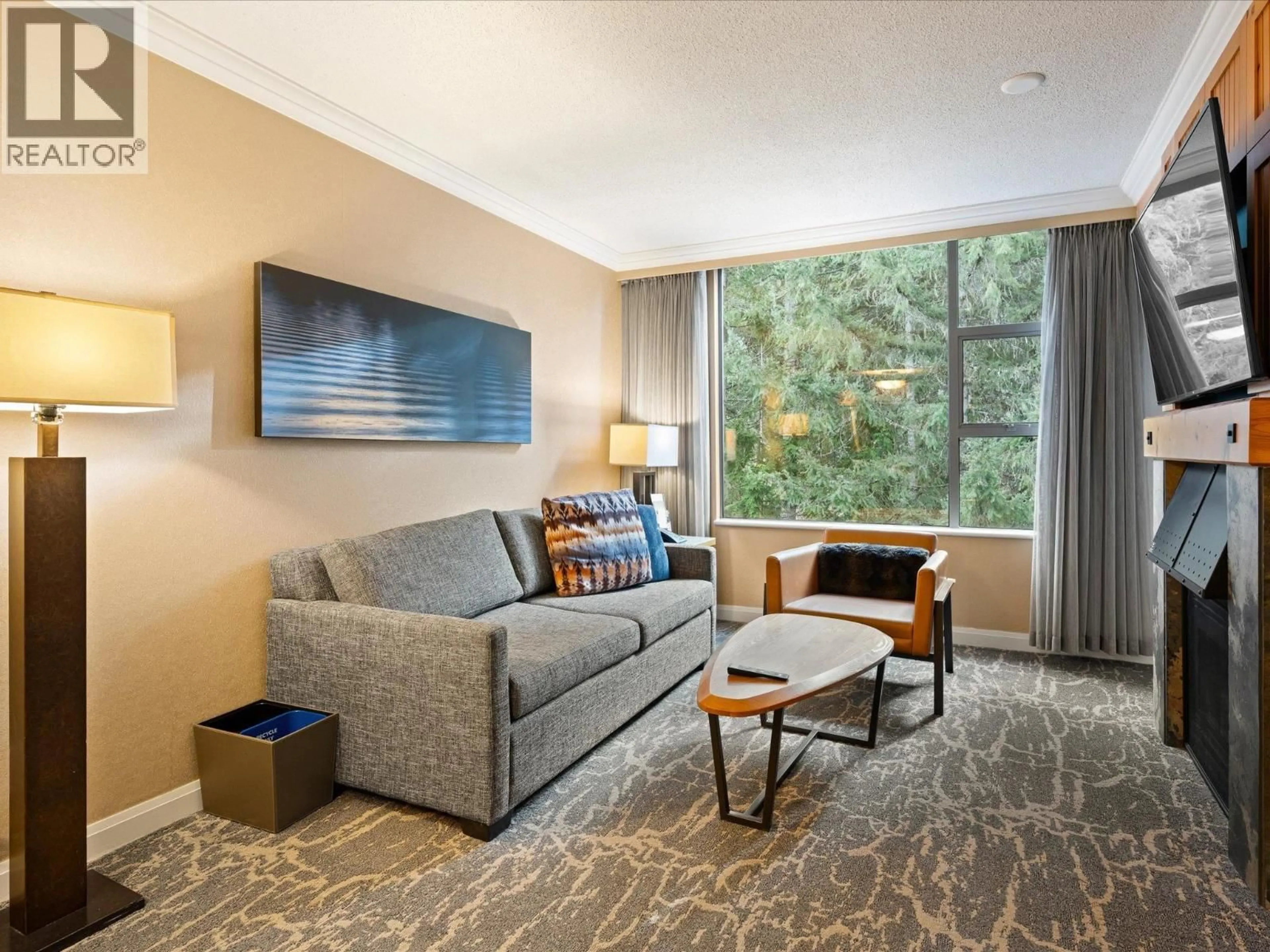Living room with furniture, carpet floor for 972 - 4090 WHISTLER WAY, Whistler British Columbia V8E1J3