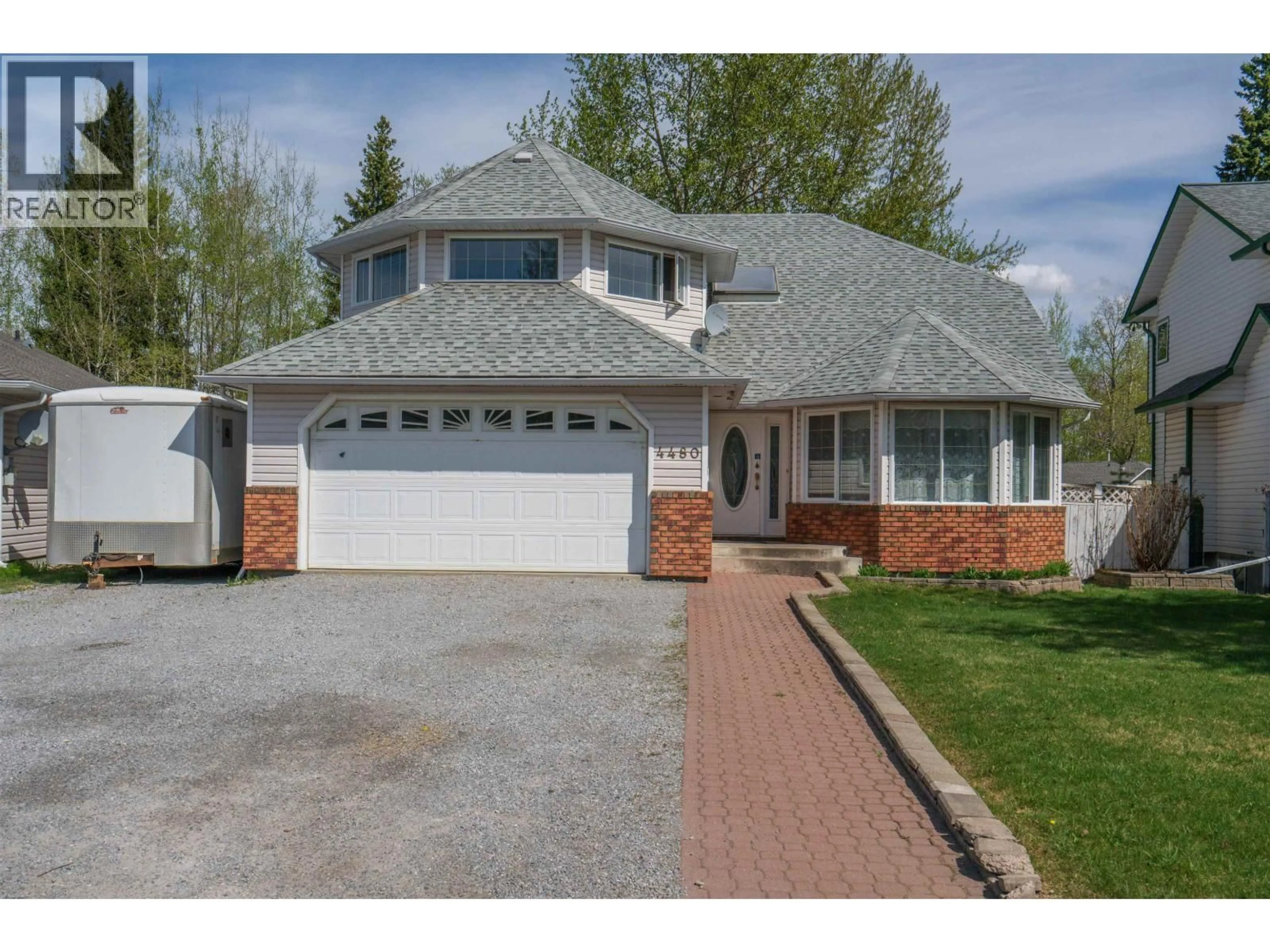 Home with brick exterior material, street for 4480 WHEELER ROAD, Prince George British Columbia V2N5H7
