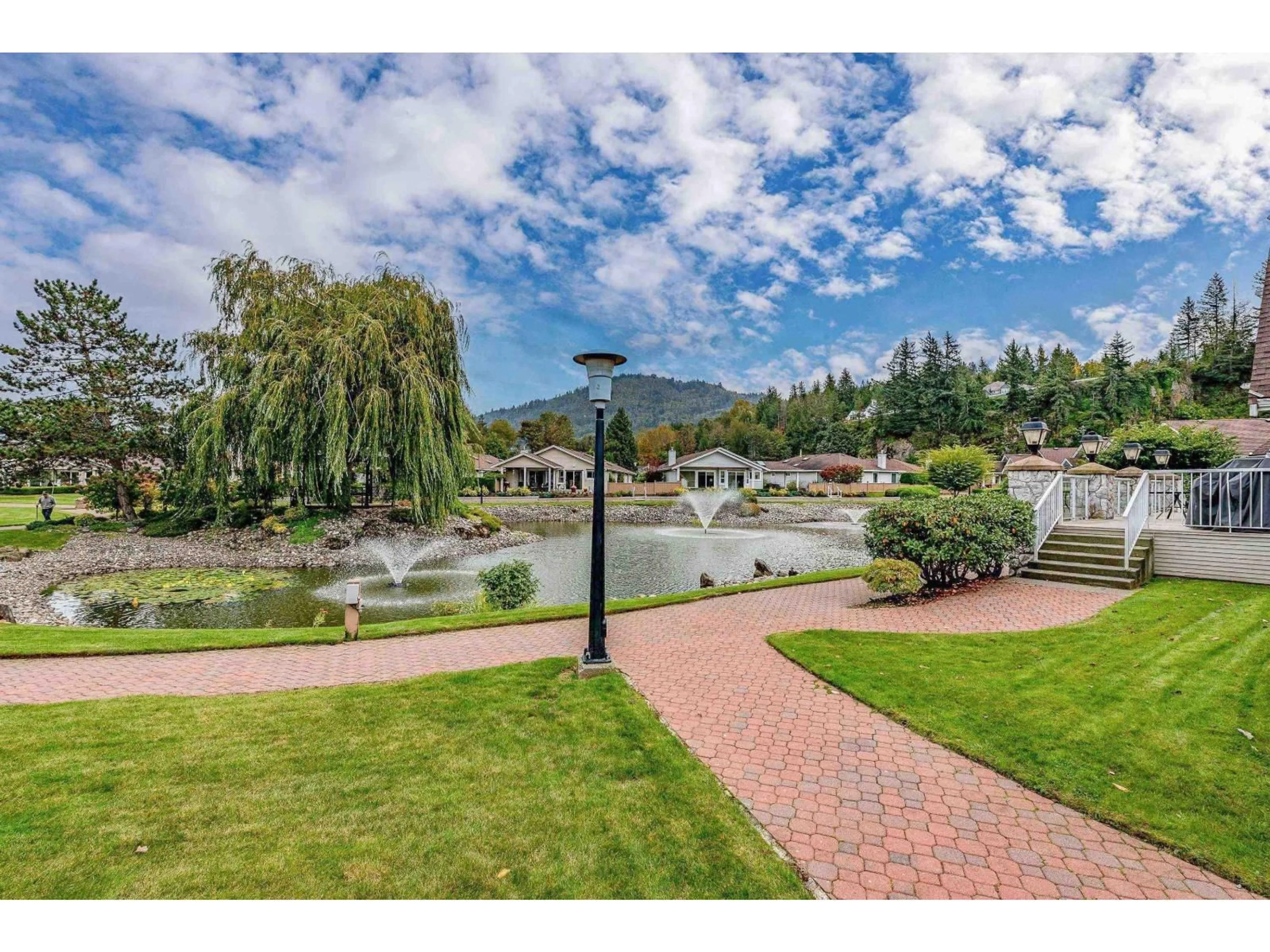 A pic from outside/outdoor area/front of a property/back of a property/a pic from drone, water/lake/river/ocean view for 59 - 6001 PROMONTORY ROAD, Chilliwack British Columbia V2R3E3