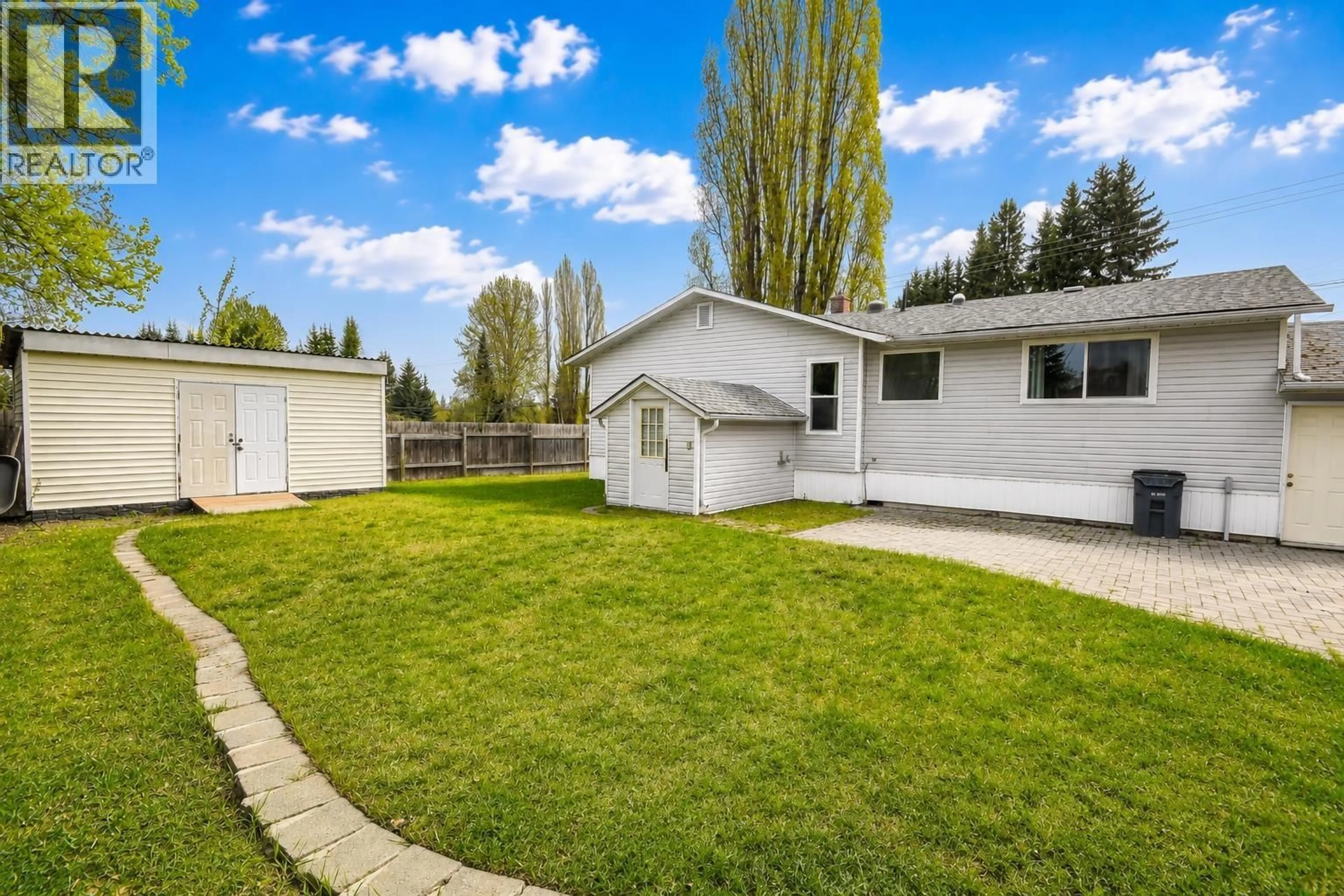 Home with vinyl exterior material, street for 4090 WEISBROD ROAD, Prince George British Columbia V2K2S5