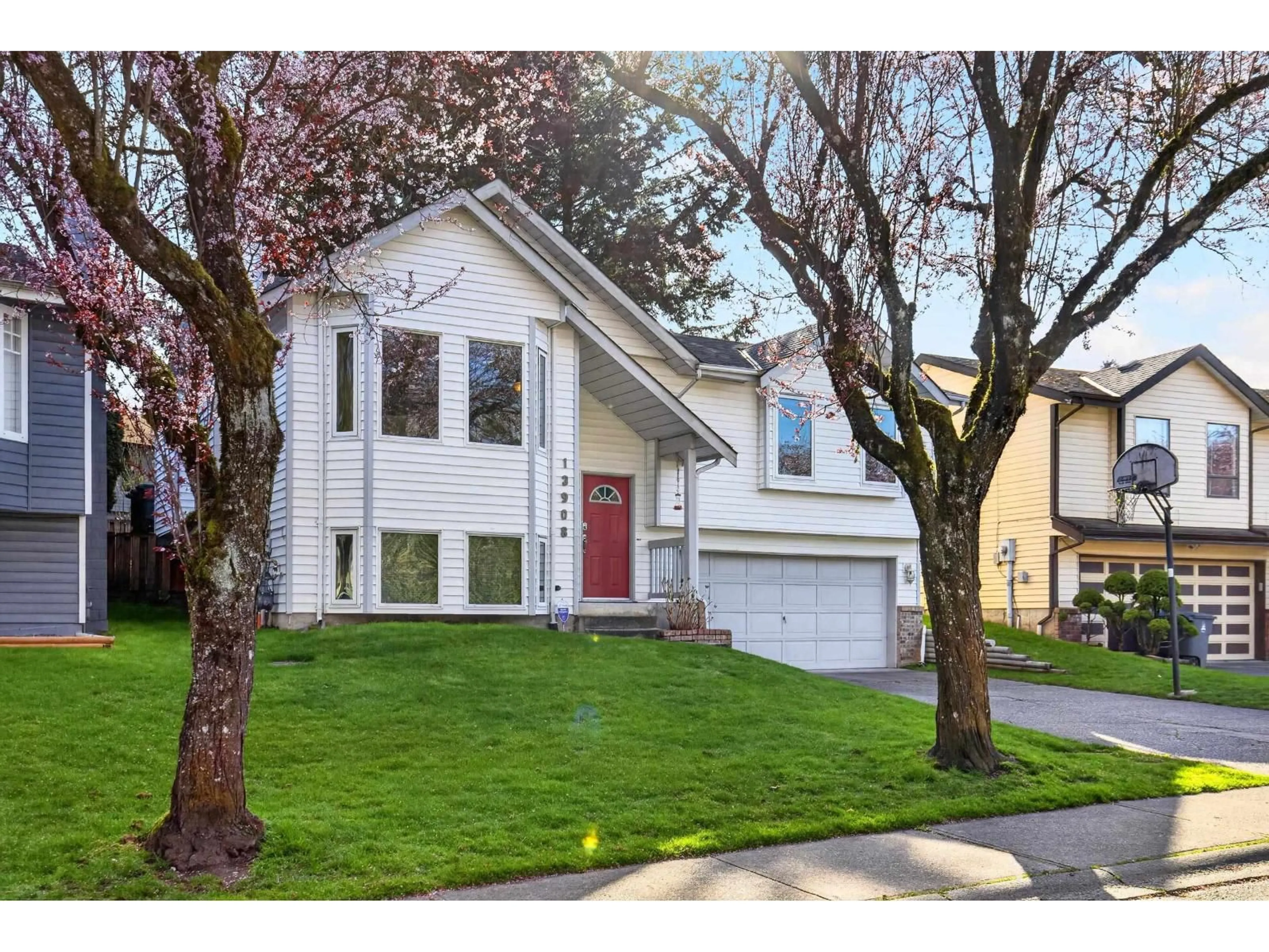 Home with vinyl exterior material, street for 13908 80B AVENUE, Surrey British Columbia V3W9B4
