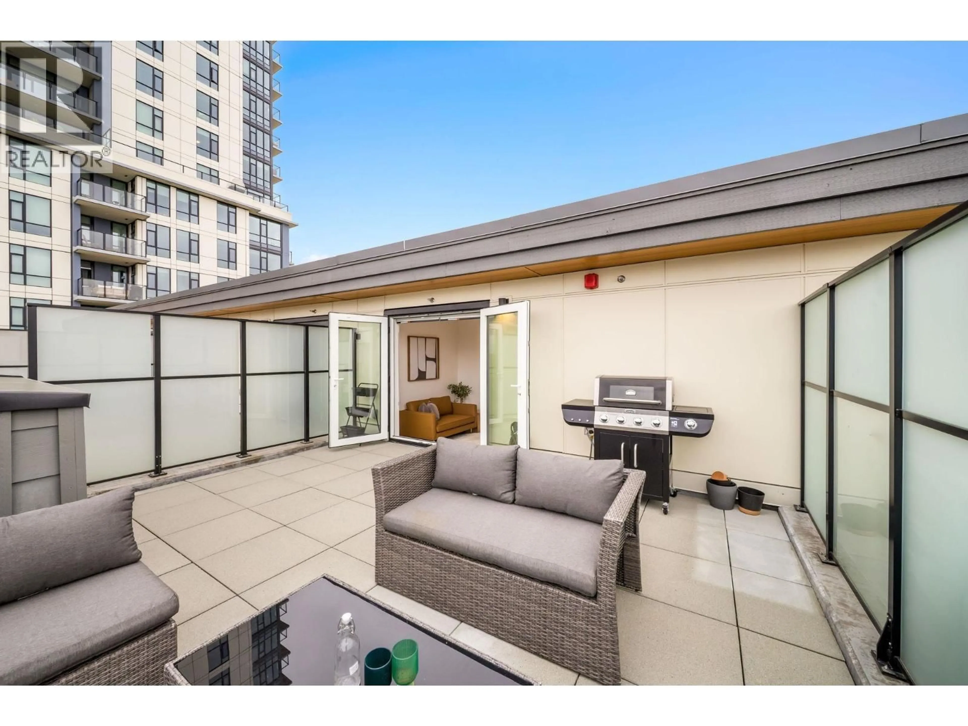 Patio, city buildings view from balcony for 3956 DUMFRIES STREET, Vancouver British Columbia V5N0J1