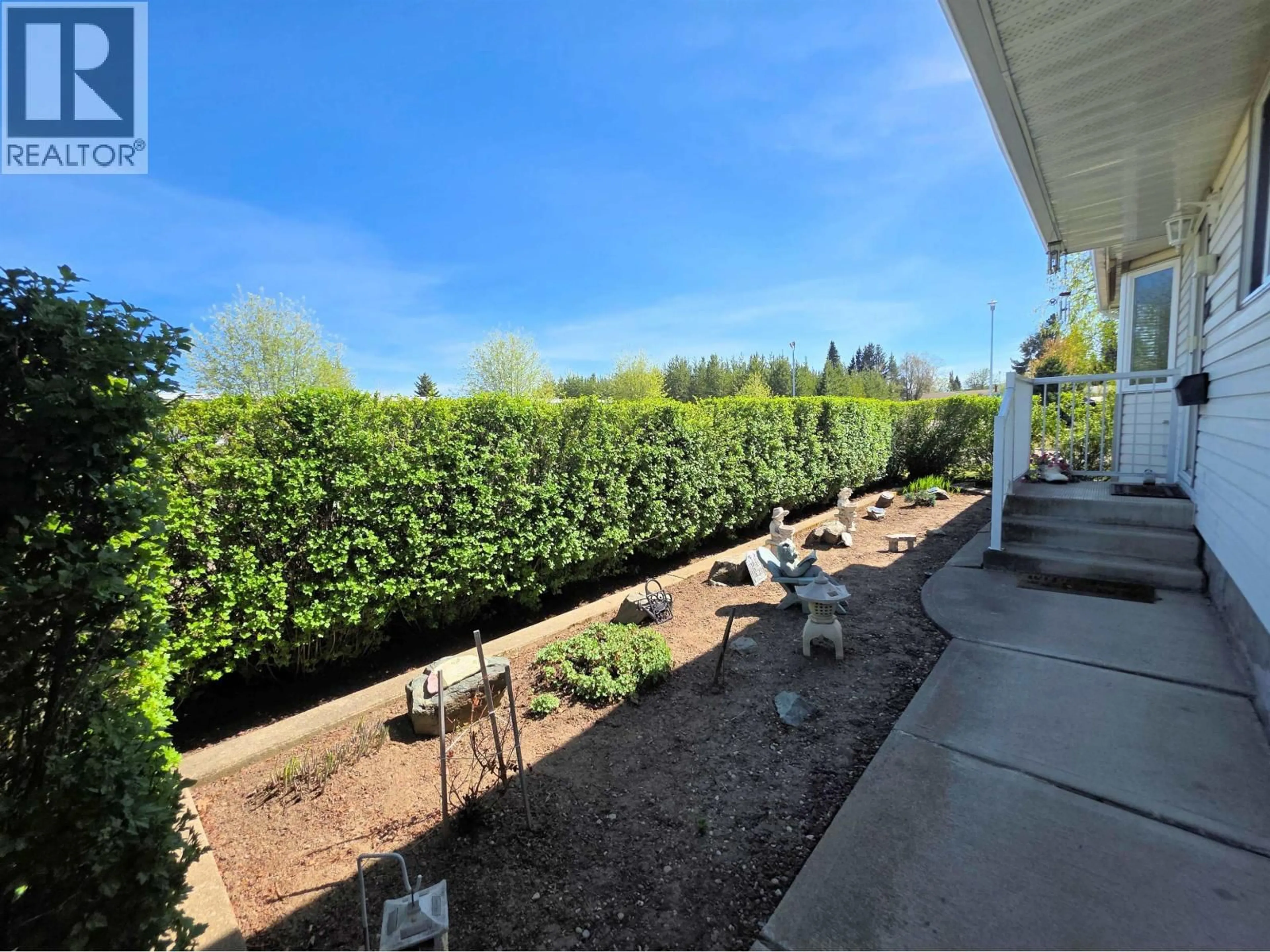 A pic from outside/outdoor area/front of a property/back of a property/a pic from drone, forest/trees view for 957 KERRY STREET, Prince George British Columbia V2M6B9