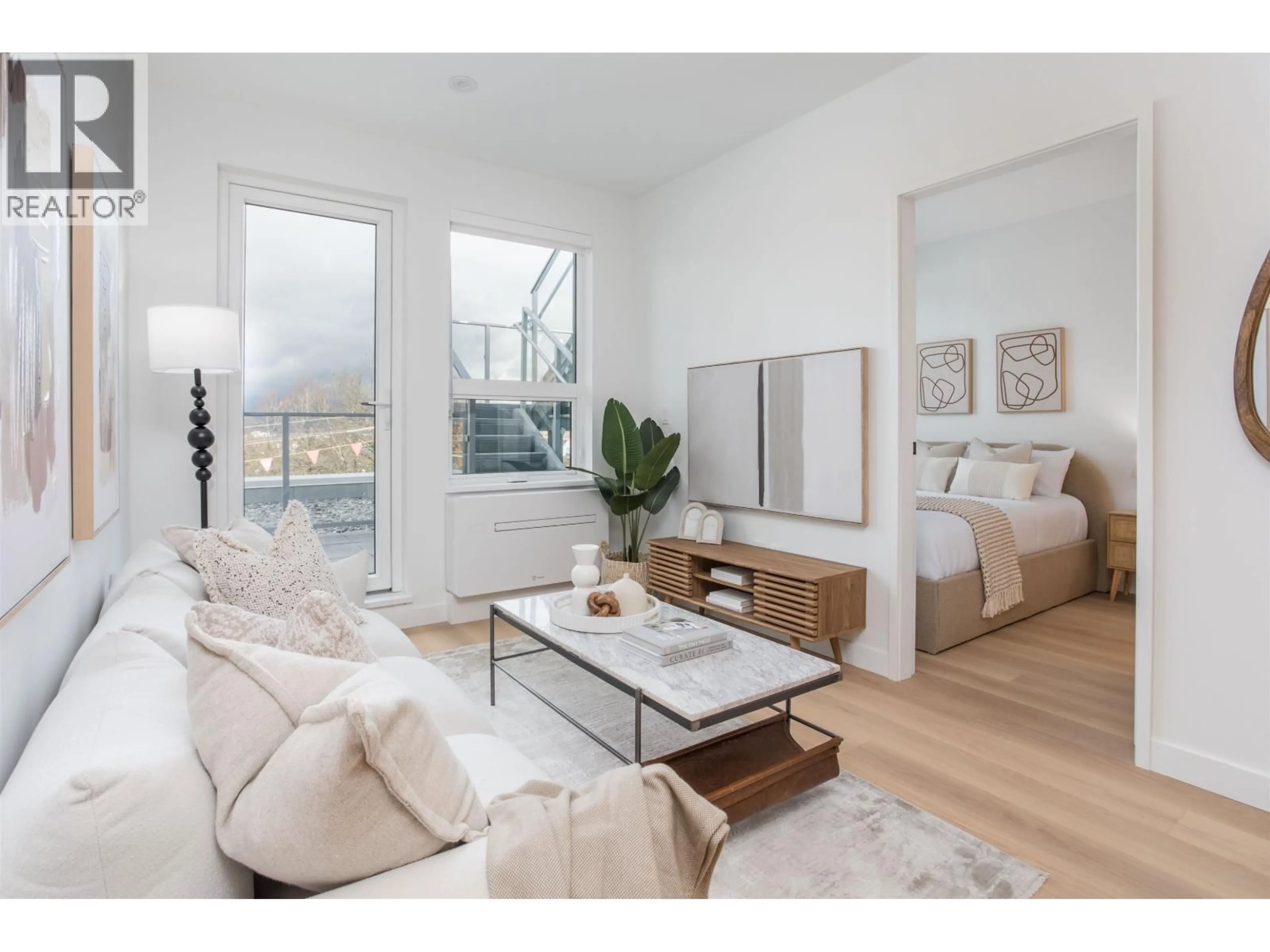 Living room with furniture, wood/laminate floor for PH521 - 2471 ST. GEORGE STREET, Vancouver British Columbia V5T1W9