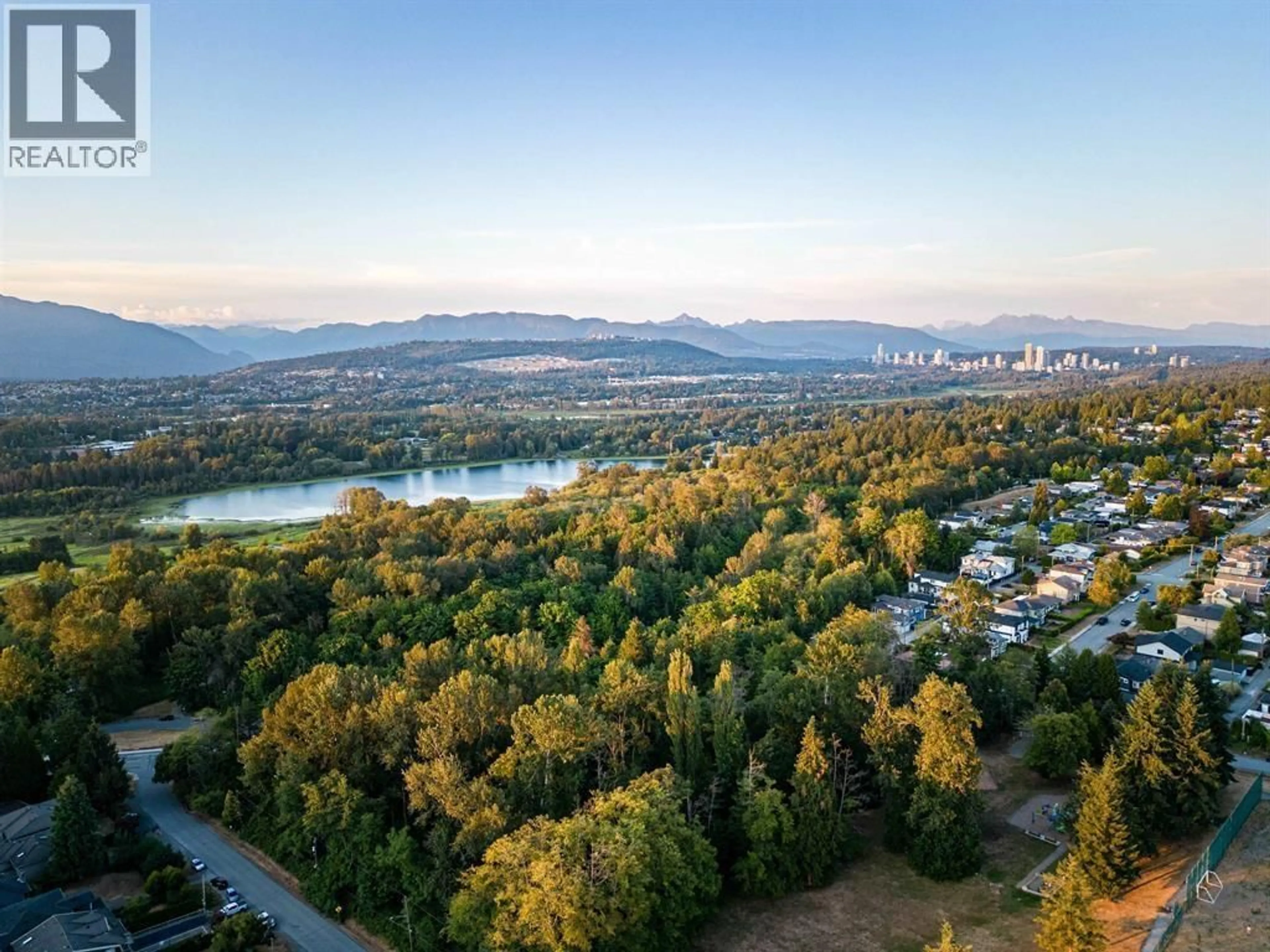 A pic from outside/outdoor area/front of a property/back of a property/a pic from drone, forest/trees view for 7668 WHEATER COURT, Burnaby British Columbia V5E4P3