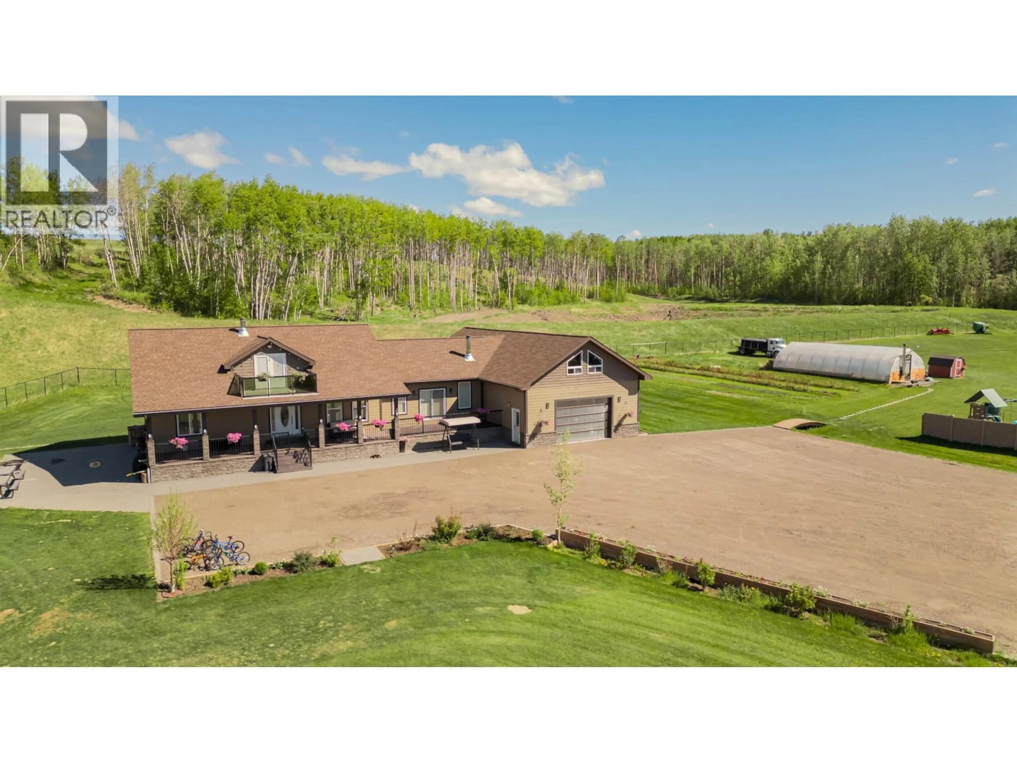 A pic from outside/outdoor area/front of a property/back of a property/a pic from drone, unknown for 13828 256 ROAD, Fort St. John British Columbia V0C1Y0