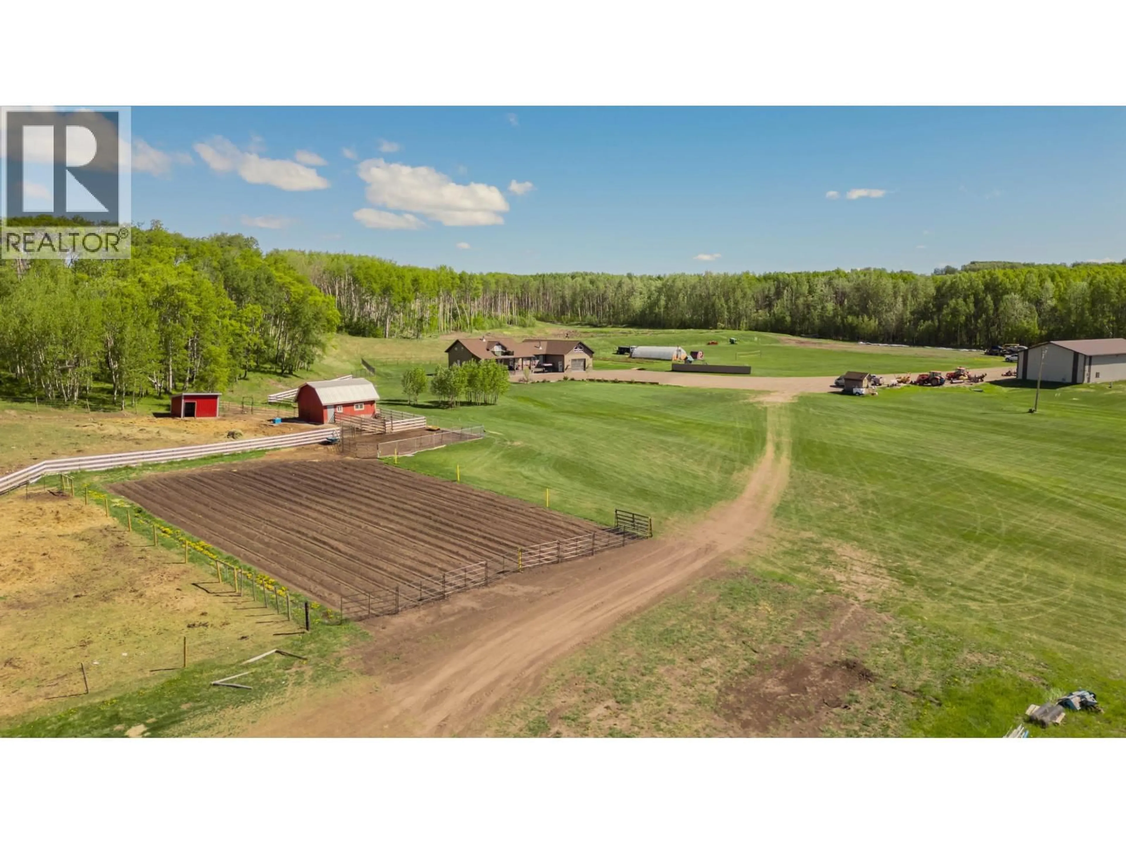 A pic from outside/outdoor area/front of a property/back of a property/a pic from drone, unknown for 13828 256 ROAD, Fort St. John British Columbia V0C1Y0
