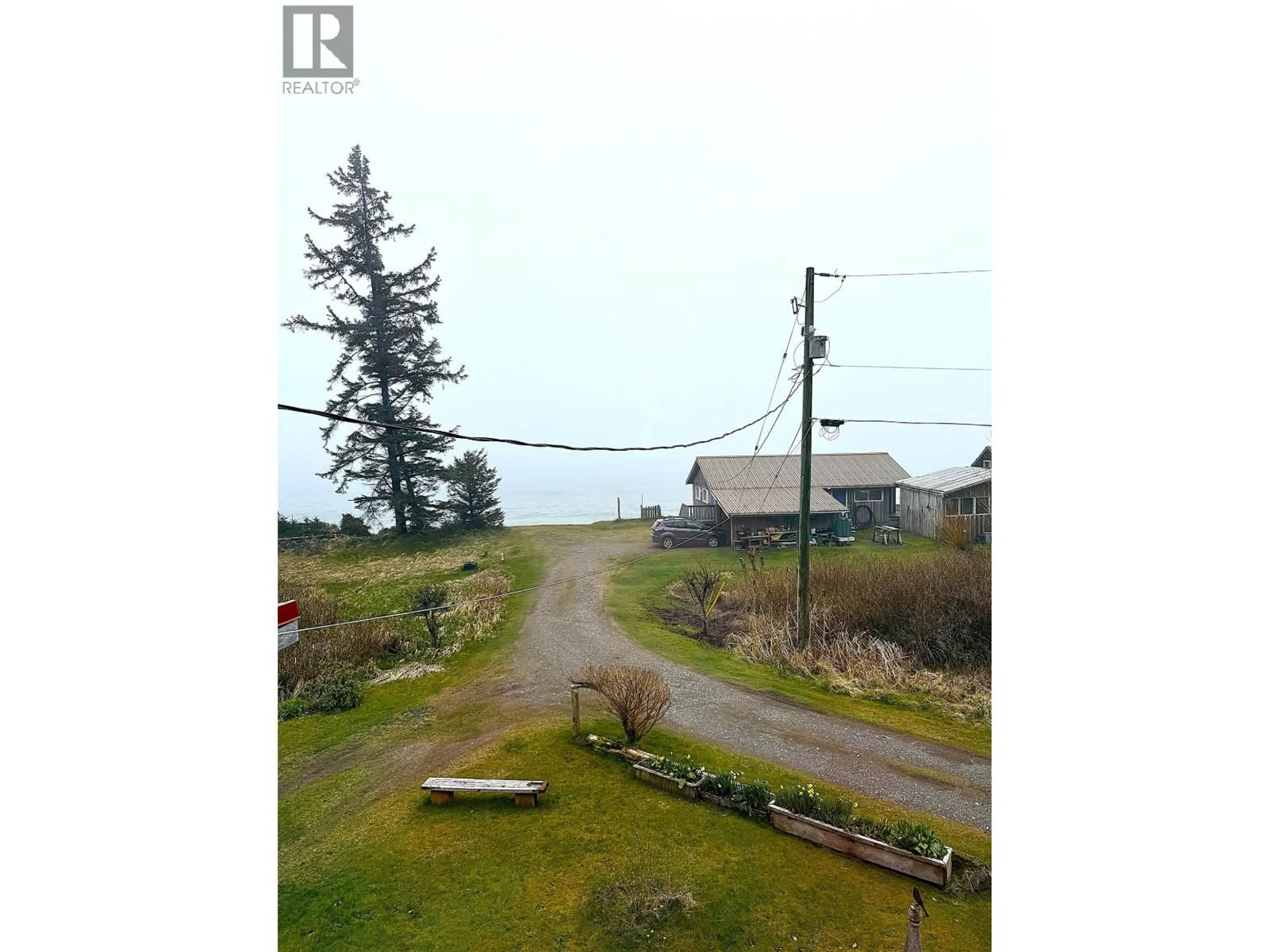 A pic from outside/outdoor area/front of a property/back of a property/a pic from drone, water/lake/river/ocean view for 556 DAVIS ROAD, Daajing Giids Rural British Columbia V0T1Y0