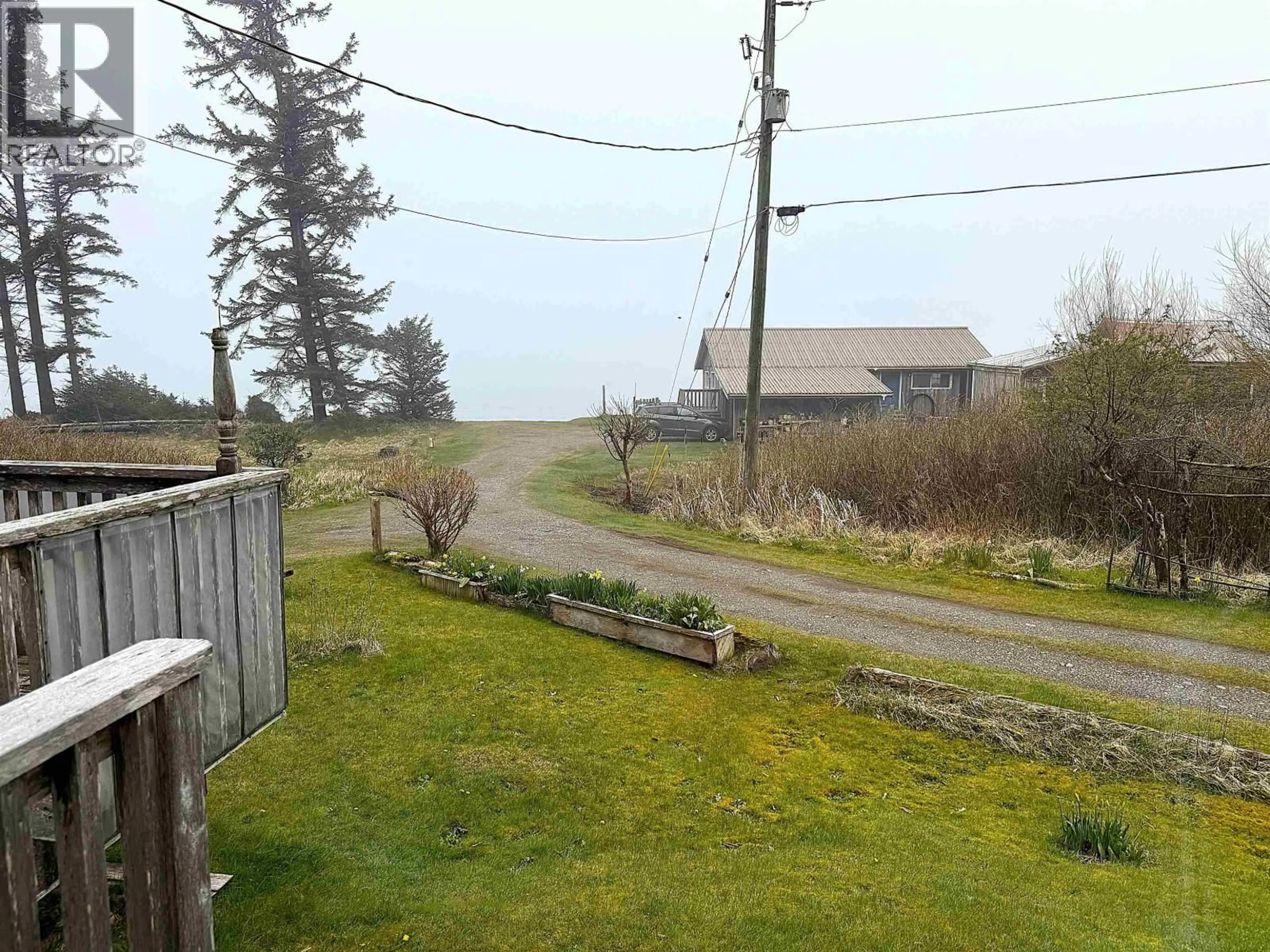 A pic from outside/outdoor area/front of a property/back of a property/a pic from drone, unknown for 556 DAVIS ROAD, Daajing Giids Rural British Columbia V0T1Y0