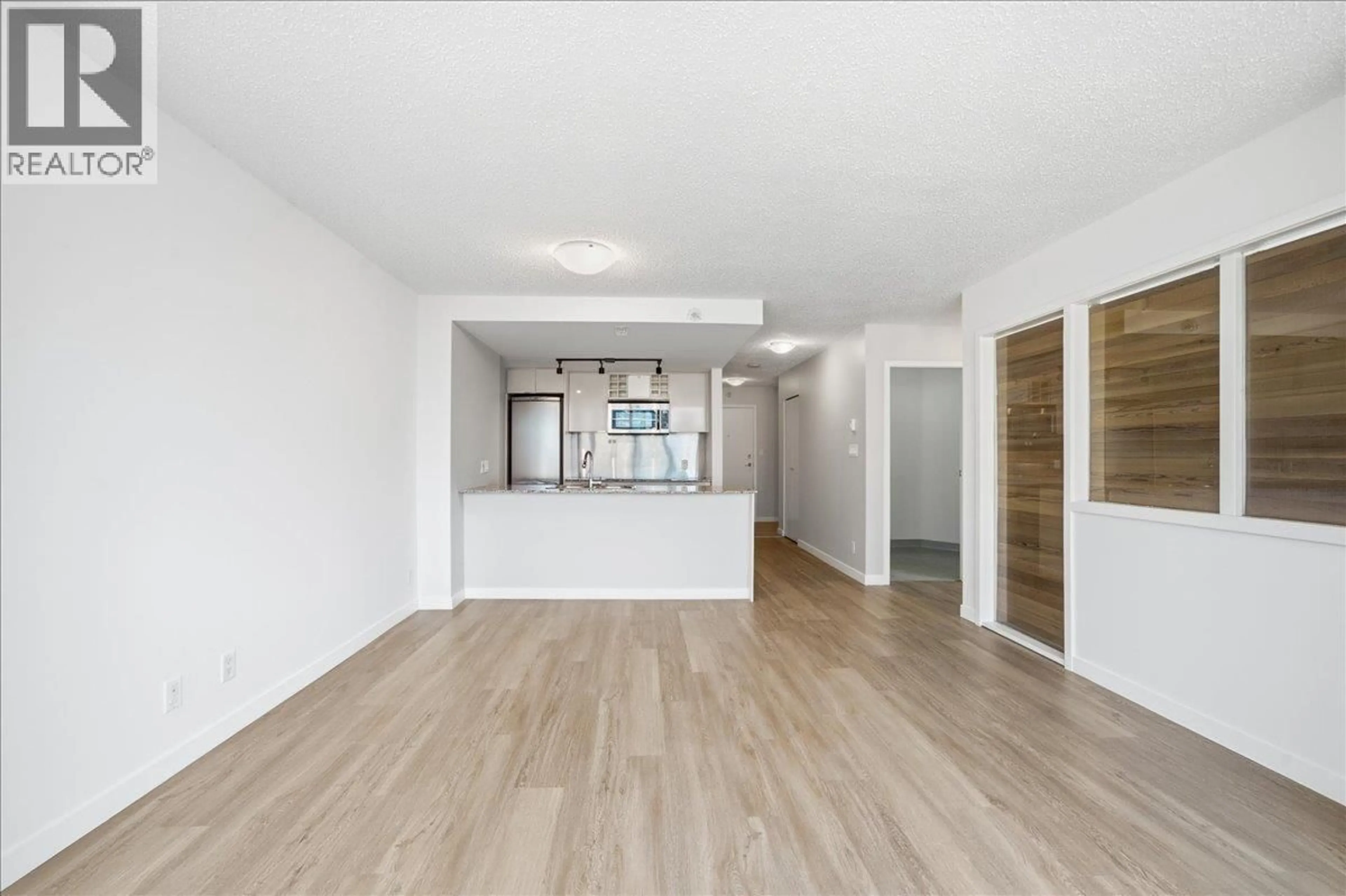 Open concept kitchen, wood/laminate floor for 1605 - 788 HAMILTON STREET, Vancouver British Columbia V6B0E9