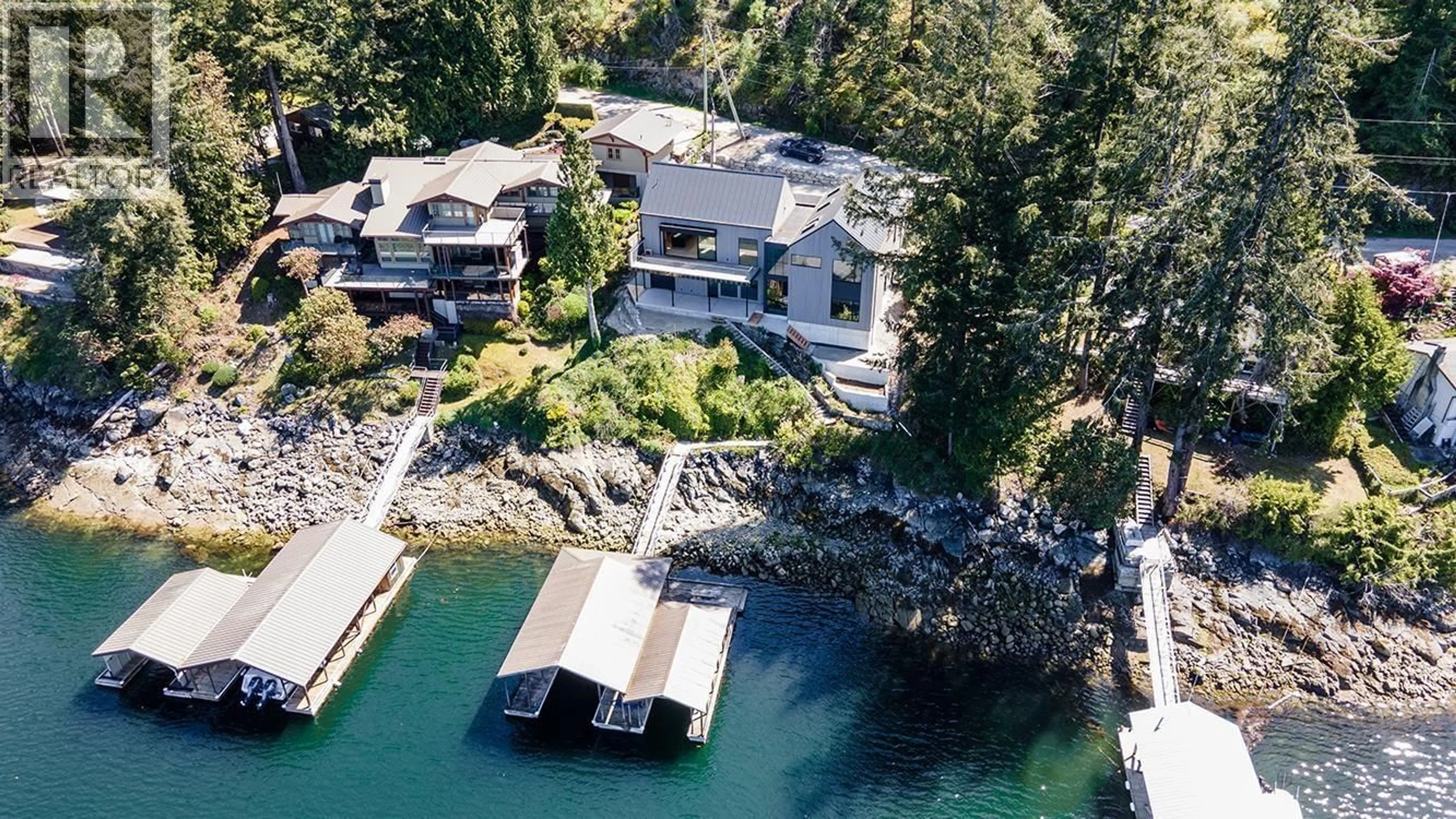 A pic from outside/outdoor area/front of a property/back of a property/a pic from drone, water/lake/river/ocean view for 4976 JOHNSTONE ROAD, Madeira Park British Columbia V9Y5L9
