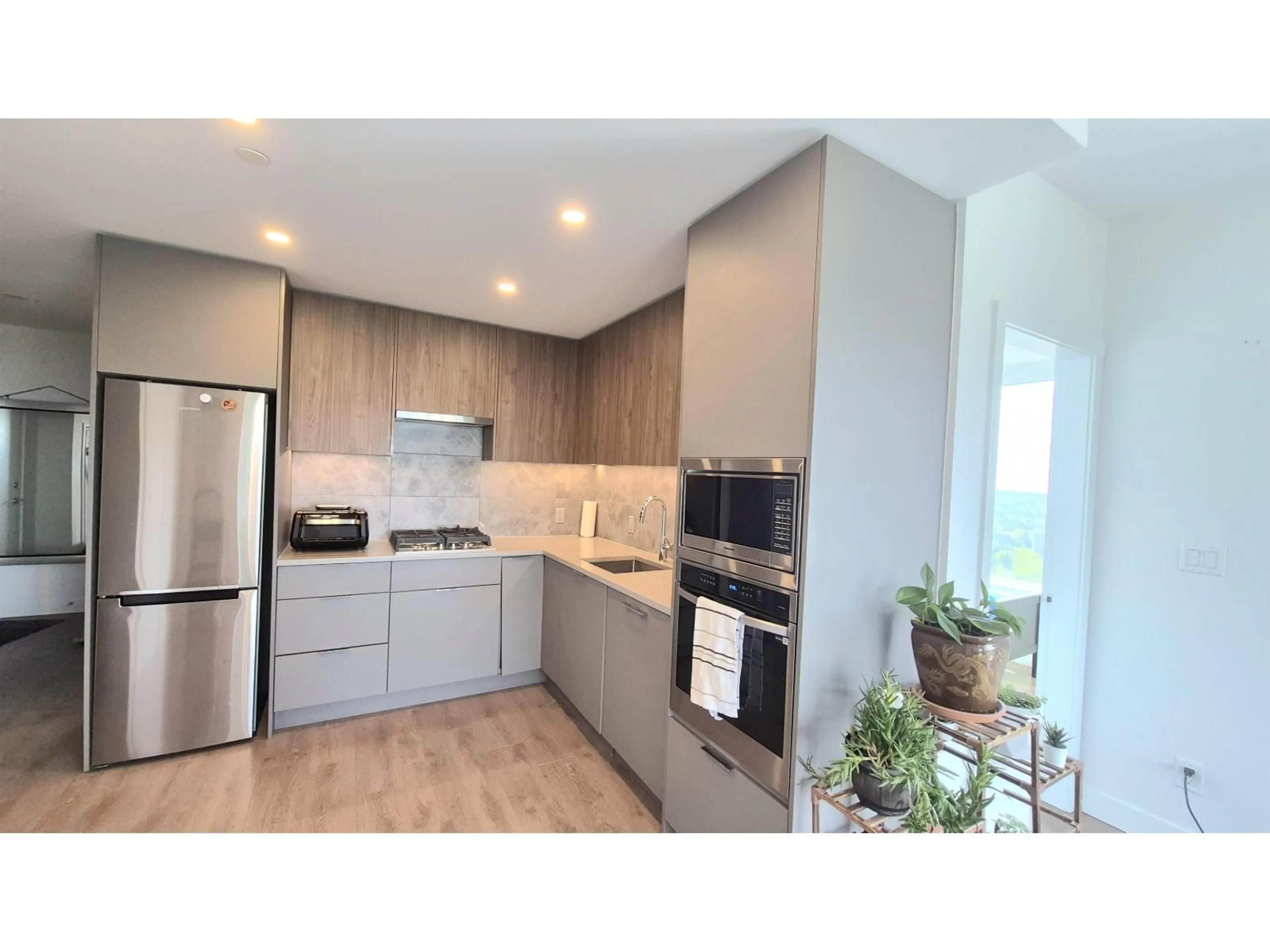 Open concept kitchen, unknown for 2207 - 13359 OLD YALE ROAD, Surrey British Columbia V3T0S4