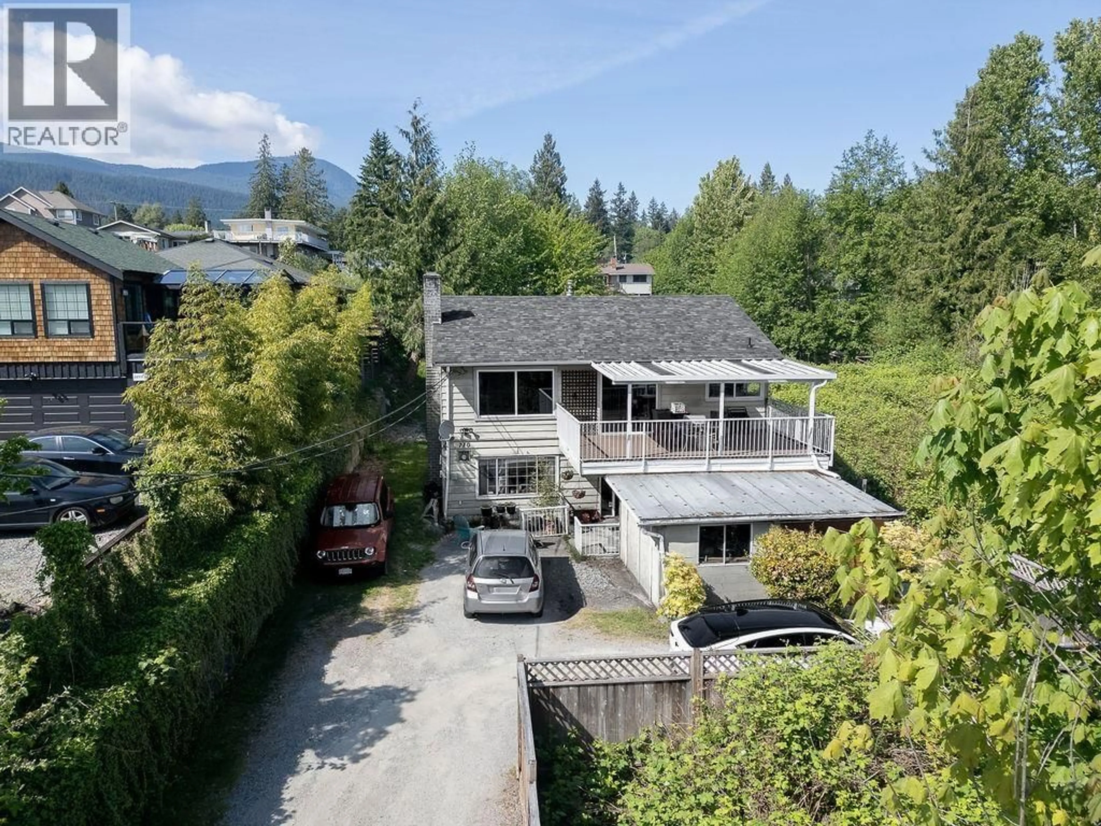 A pic from outside/outdoor area/front of a property/back of a property/a pic from drone, mountain view for 710 GIBSONS WAY, Gibsons British Columbia V0N1V9