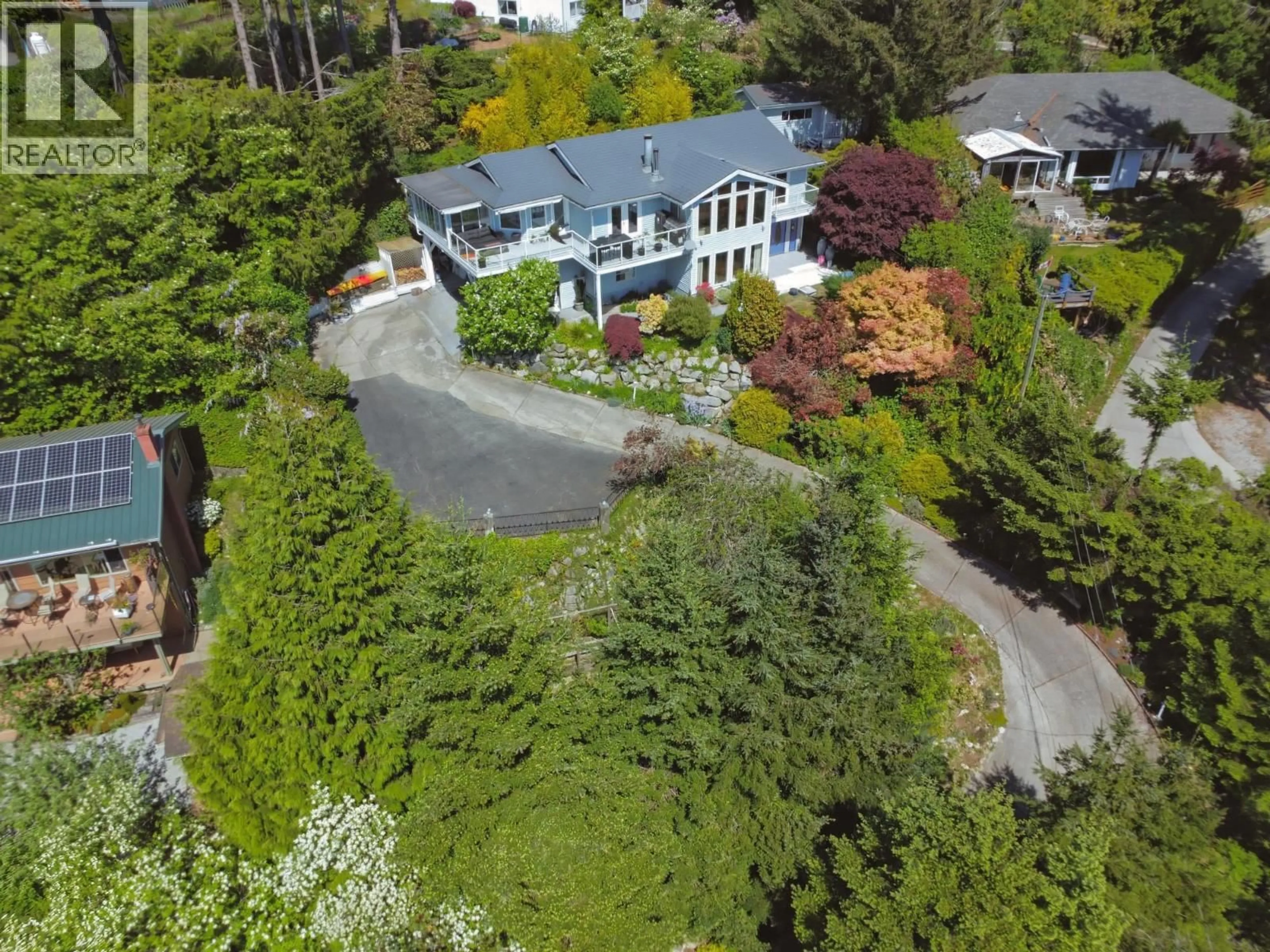 A pic from outside/outdoor area/front of a property/back of a property/a pic from drone, street for 4723 HOTEL LAKE ROAD, Pender Harbour British Columbia V0N1S1