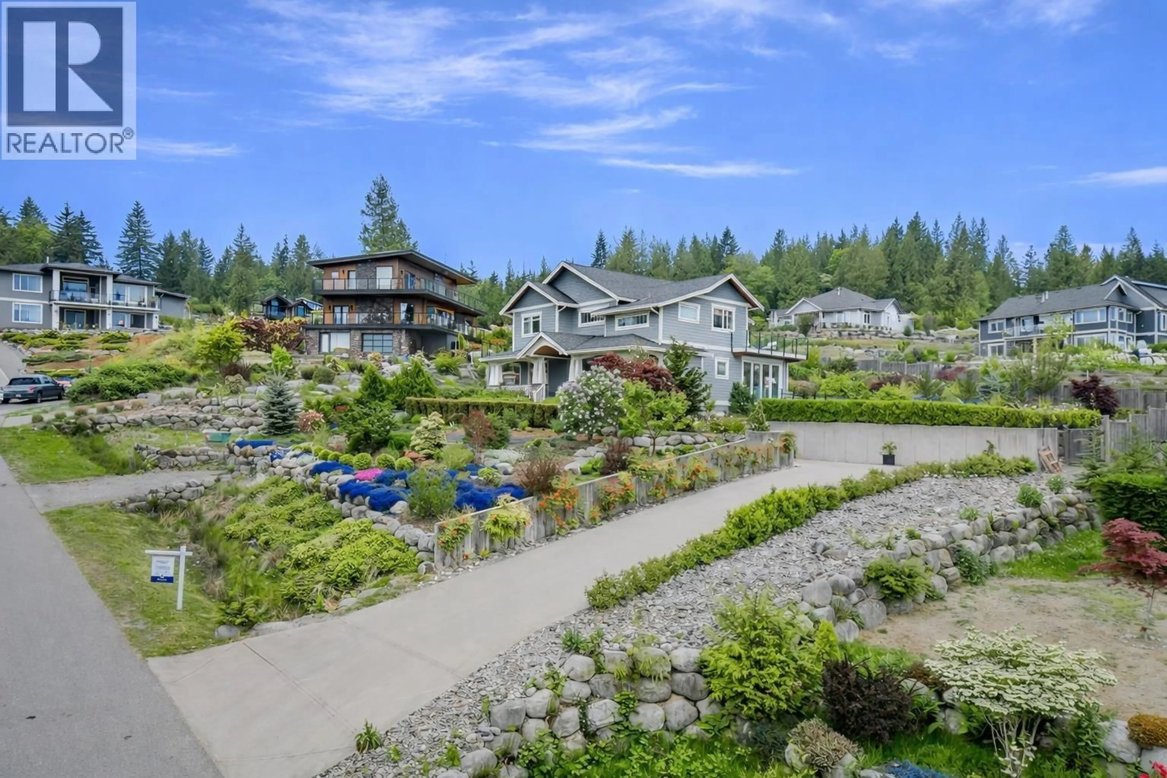 A pic from outside/outdoor area/front of a property/back of a property/a pic from drone, mountain view for 791 COURTNEY ROAD, Gibsons British Columbia V0N1V1