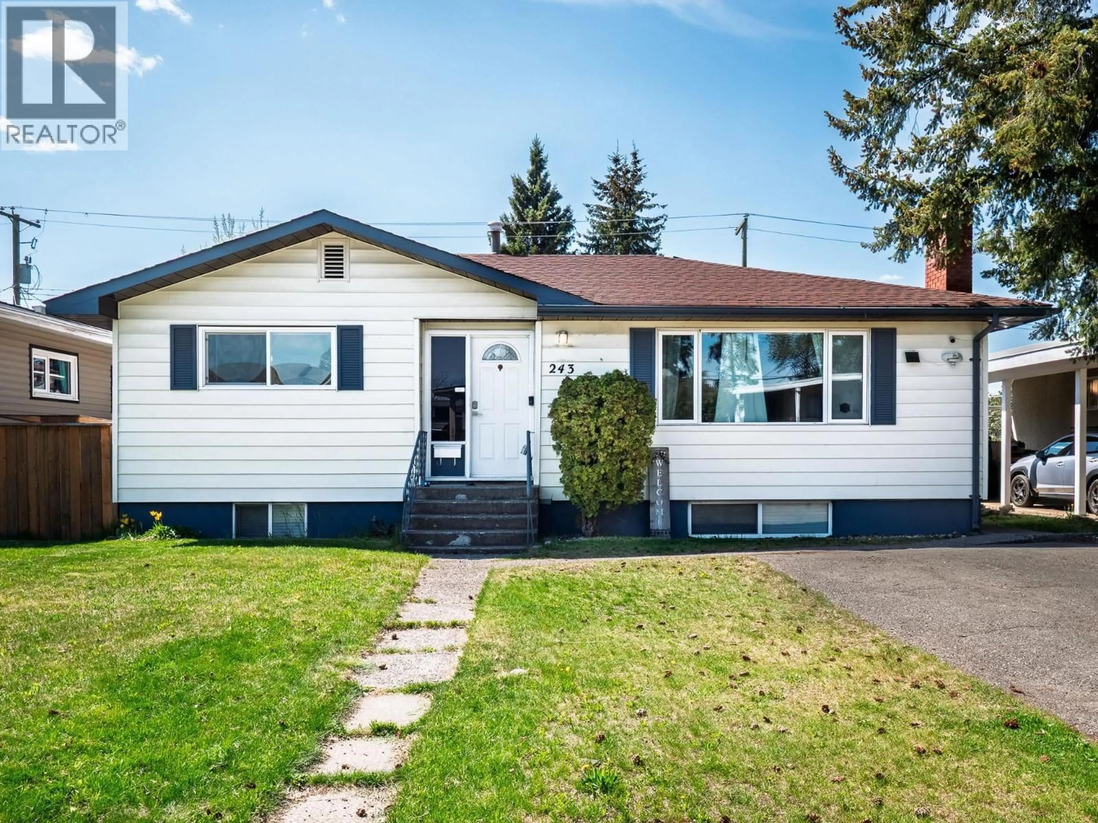 Home with vinyl exterior material, street for 243 NICHOLSON STREET, Prince George British Columbia V2M3L8