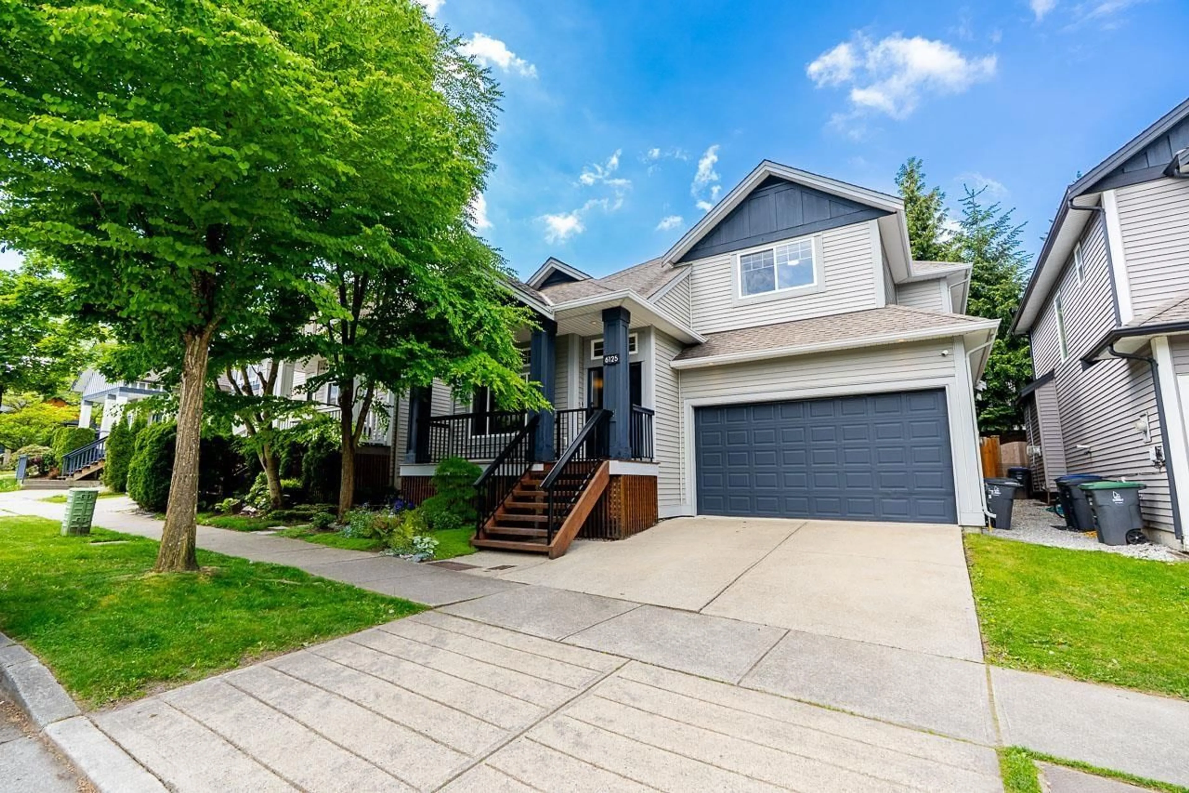 Home with vinyl exterior material, street for 6125 150A STREET, Surrey British Columbia V3S7W9