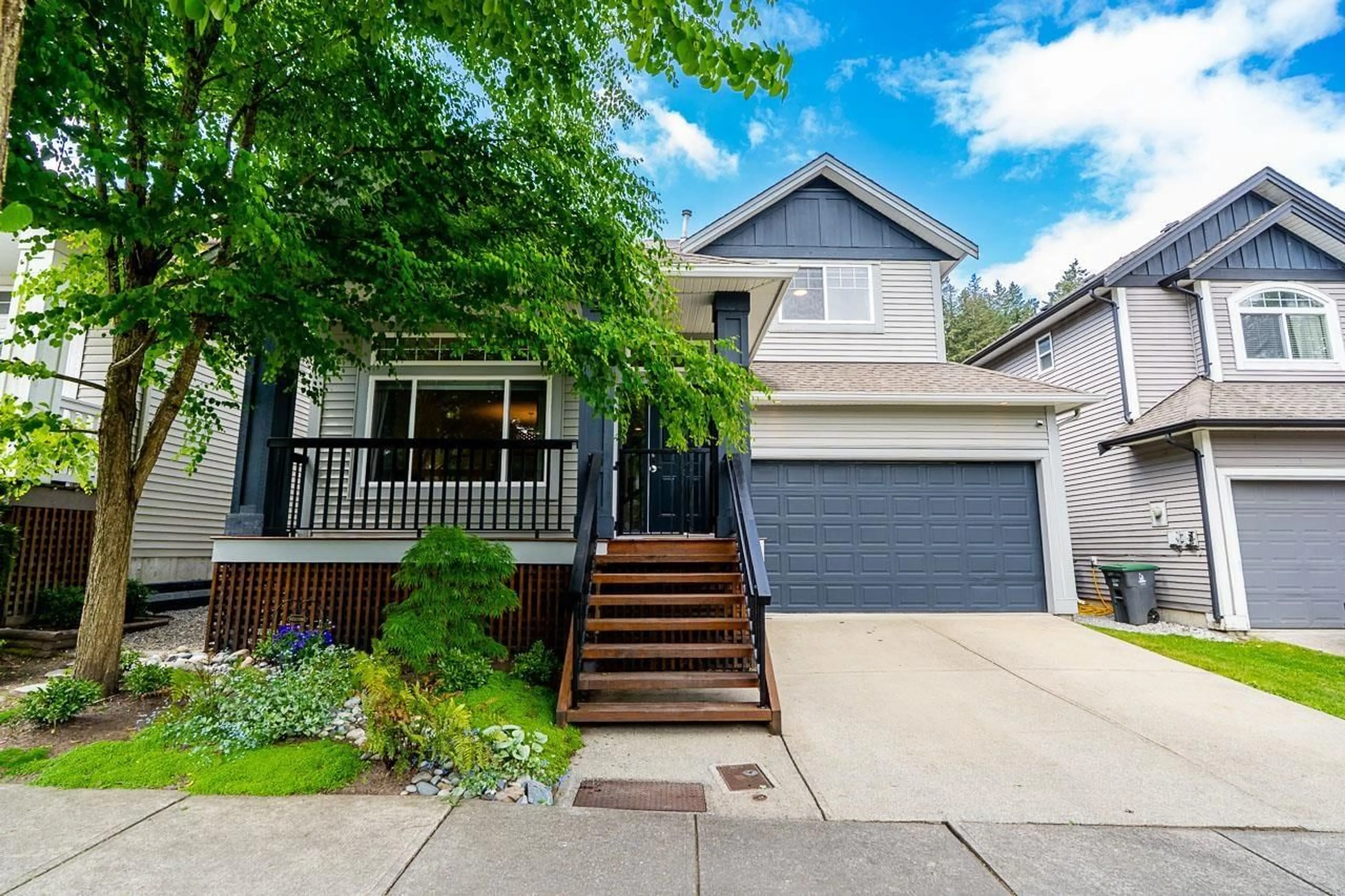 Home with vinyl exterior material, street for 6125 150A STREET, Surrey British Columbia V3S7W9