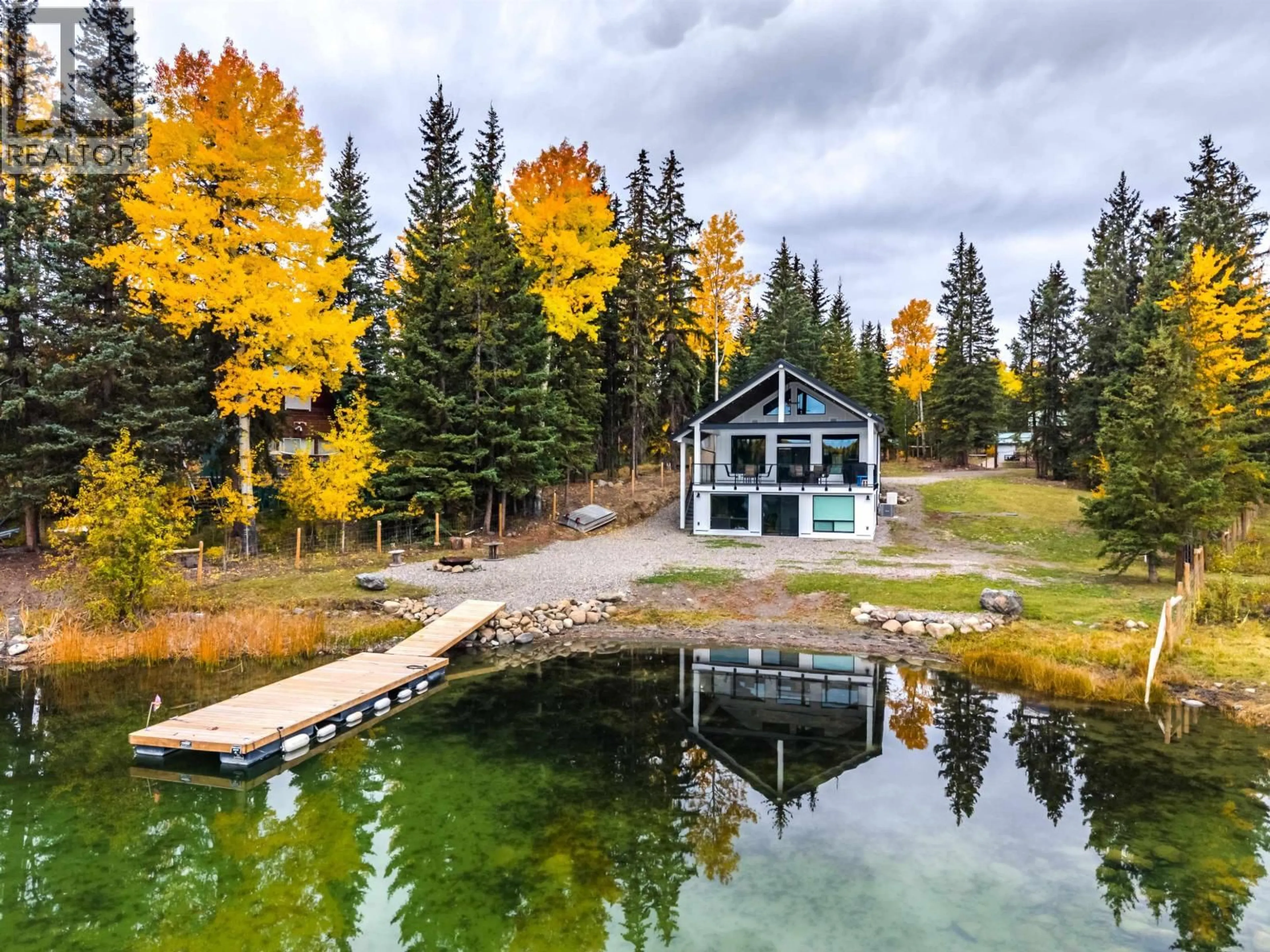 A pic from outside/outdoor area/front of a property/back of a property/a pic from drone, water/lake/river/ocean view for 7231 NATH ROAD, Sheridan Lake British Columbia V0K1X1