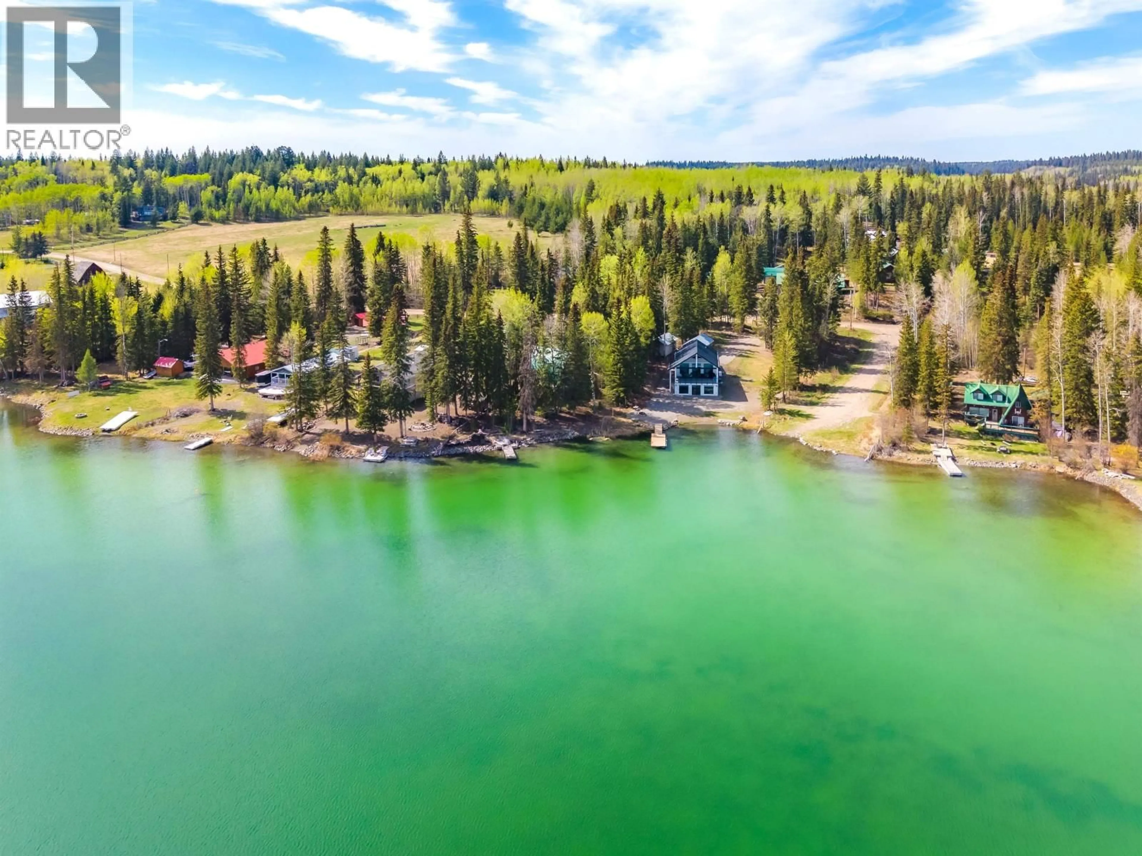 A pic from outside/outdoor area/front of a property/back of a property/a pic from drone, water/lake/river/ocean view for 7231 NATH ROAD, Sheridan Lake British Columbia V0K1X1