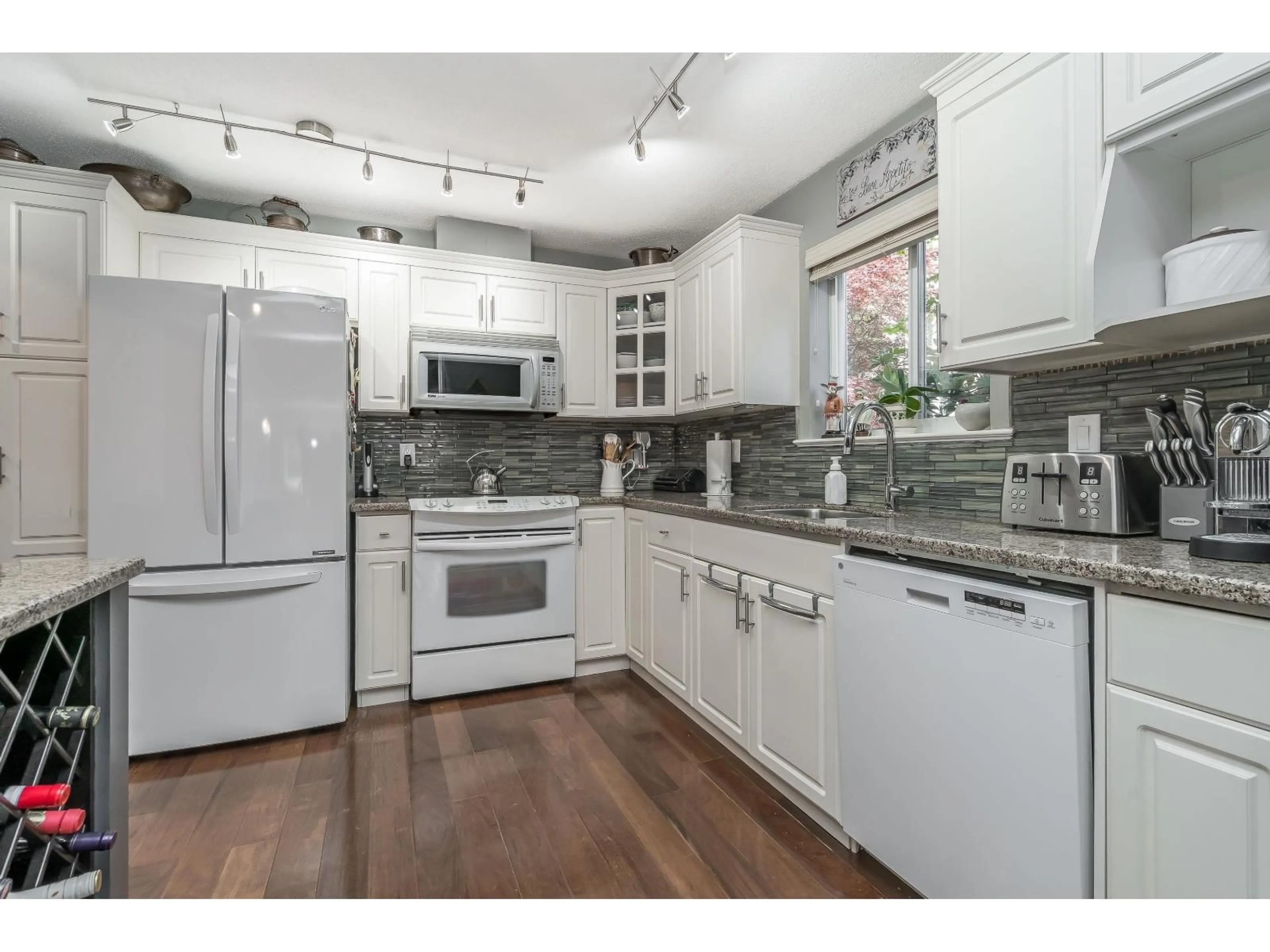 Open concept kitchen, unknown for 106 - 15342 20 AVENUE, Surrey British Columbia V4A2A3